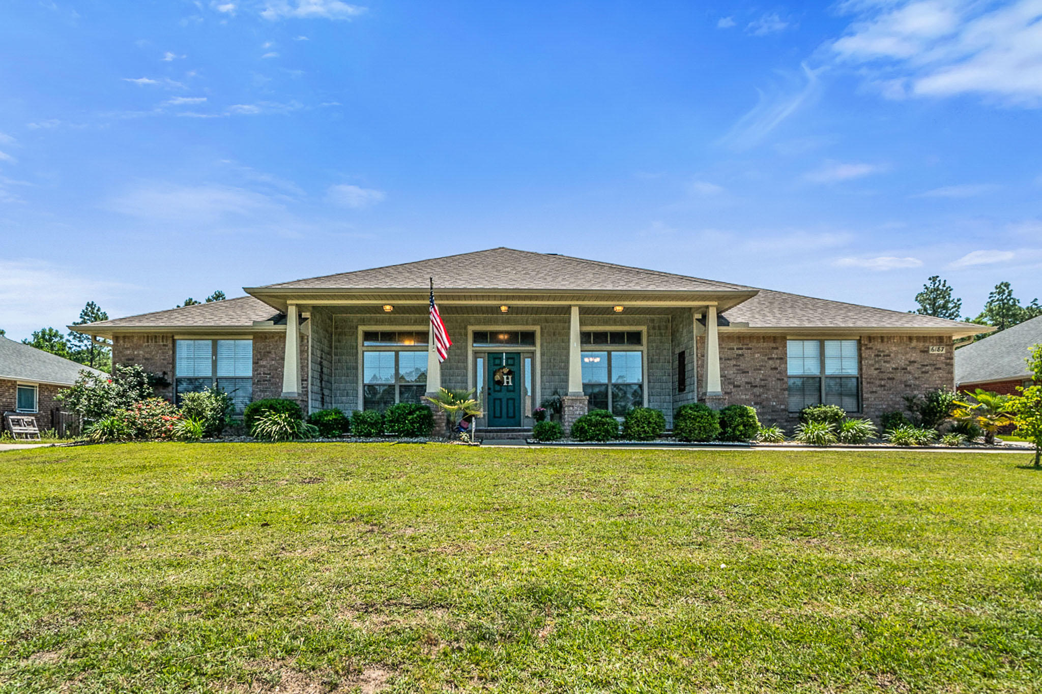 Inviting covered country front porch invites you into this gorgeous 3036 sf brick home located on a level -1/2 acre lot with privacy fenced backyard. As you enter the home you will find Spanish Lane textured walls, rounded corners & ceilings painted in neutral colors. The home features a formal dining room, den & French doors that lead you to the 25x11 Florida room. The living room has a double trey ceiling with crown molding & tiled gas fireplace with mantle. The kitchen has granite countertops, tile backsplash, breakfast nook, tiled breakfast bar, spacious walk-in pantry & comes with stainless steel appliances that include, smooth top range, microwave, dishwasher & refrigerator. Crown molding and trey ceiling in master bedroom. The master bathroom has 2 spacious walk-in closets, separate