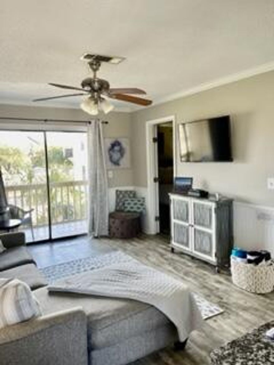 A must see, across the street and just steps away from sugar white beaches for under $300K and one of the lowest dues in the area! This recently updated condo is completely ready for you to enjoy or use as a rental property. Unit has been newly painted and furnished 'beach chic' with LVP flooring queen mattresses and extra sleeping nook., Complex is small with only 13 units total and unit has a separate outside storage unit to store all of your beach toys! Great rental potential too!