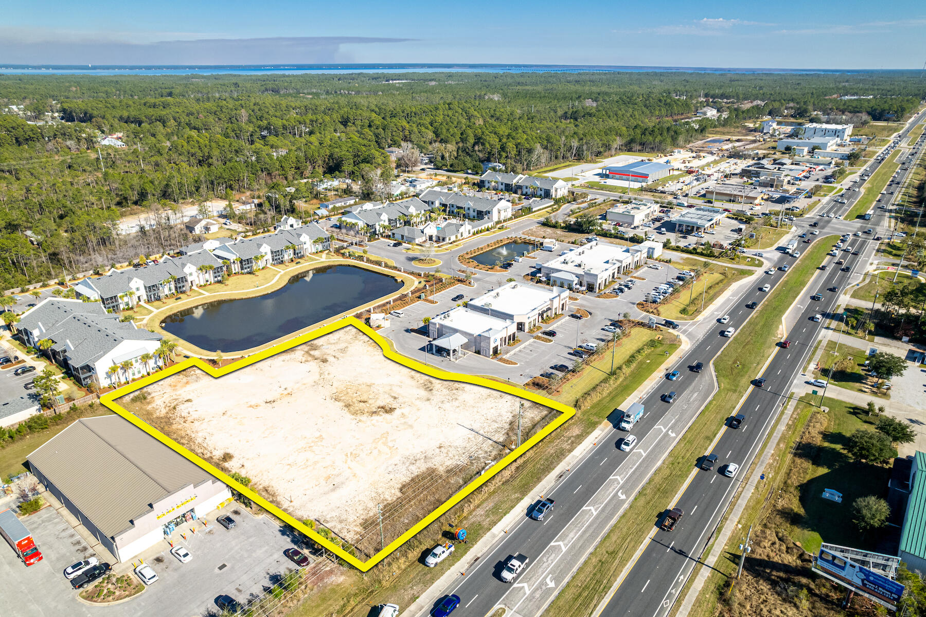 DEVELOPMENT ORDER in HAND for the construction of an 11,132 SF Subdividable Building with Drive-Thru!  239' of Highway 98 frontage enjoying the benefits of a existing deceleration lane!  Rough-graded pad site maximizing buildable yield through its valuable offsite water retention system!  Currently, one of the most premier, vertical build-ready sites located in South Walton County, Florida. This 1.5-acre parcel, zoned Village Mixed Use, is identified on the uploaded plat as 'Parcel B' of the mixed-use development along Highway 98 in Santa Rosa Beach, Florida known as The Shops at 393, which offers access to the traffic light at CR 393 and Highway 98. This outparcel commands significant visibility from a traffic count of approximately +/-50,000 vehicles daily. The exceptional... developer has committed over $350,000.00 to the specific site's infrastructural improvements and soft development costs to obtain the existing development order, not to mention the likely 1+ year timeline to obtain most development orders anywhere in South Walton County!  This opportunity would cater well to the development of retail, medical, or professional office uses.  The synergistic retail venue is within +/-2 miles North from Scenic 30A at Gulf Place and its multitude of beach-front parks and beach walkovers.  Please inquire for further details.