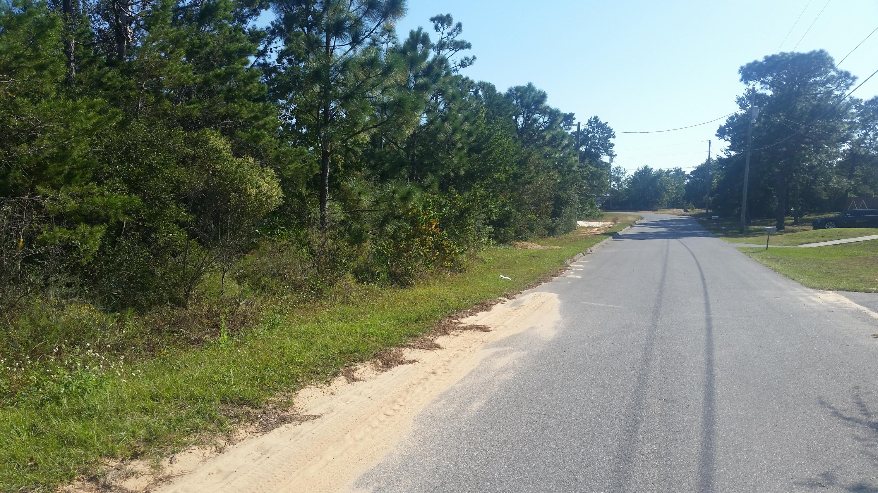 This is a fantastic vacant lot in Gulf Breeze, FL. Mobile Homes are allowed. If you are looking to build a home, this may be the perfect place to do it! There aren't many lots like this on the market for this low price! Act fast before its gone!