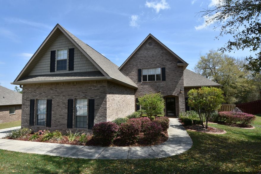 Gorgeous home with a sparkling POOL and wooded view! Get more bang for your buck in South Crestview and only 20 minutes to Duke and 7th Group! 5 Bedroom, 3 and 1/2 Bathroom all brick home in the popular Fox Valley neighborhood. Formal Dining and Sitting Rooms are each side of the tiled Foyer. Spacious Kitchen, with all appliances, Breakfast Bar and Breakfast Nook are open to the large Family Room with double tray ceiling and views of the gunite pool and wooded adjoining property. The Master Bedroom Suite features crown molding, tray ceiling, garden tub, separate shower, granite double vanity, and large walk-in closet. All of the Bedrooms have walk-in closets and ceiling fans and the full Bathrooms all have granite vanities.