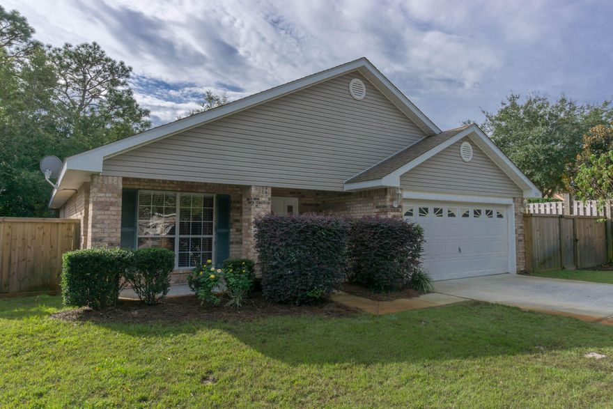 This is a great low maintenance brick home at the end of a quiet Cul de Sac.The kitchen has granite counter tops nice cabinetry and stainless appliances. The fenced back yard features a covered 30X15 Trex deck with a large flat Screen TV and porch swing. Great for entertaining. Along the west side fence are nice fruit trees. Very little yard maintenance.