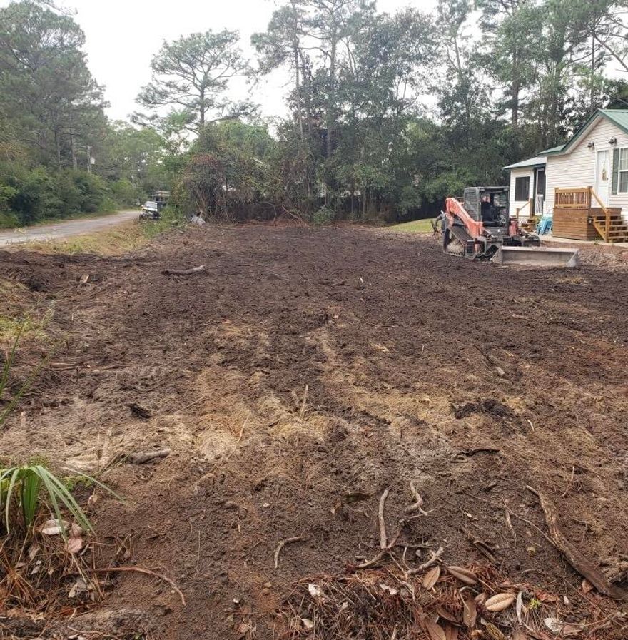 Contract fell through! Back on the market! Cleared, graded and root-raked. Build your Santa Rosa Beach home here!  Just a short drive to the bay, the beach and all 30A has to offer. Close to Cessna landing as well. Great corner lot with frontage on either Julia Ave or Central 6th depending on your house plan. Don't miss this opportunity to own your piece of South Walton!Water and Sewer are available on the street.