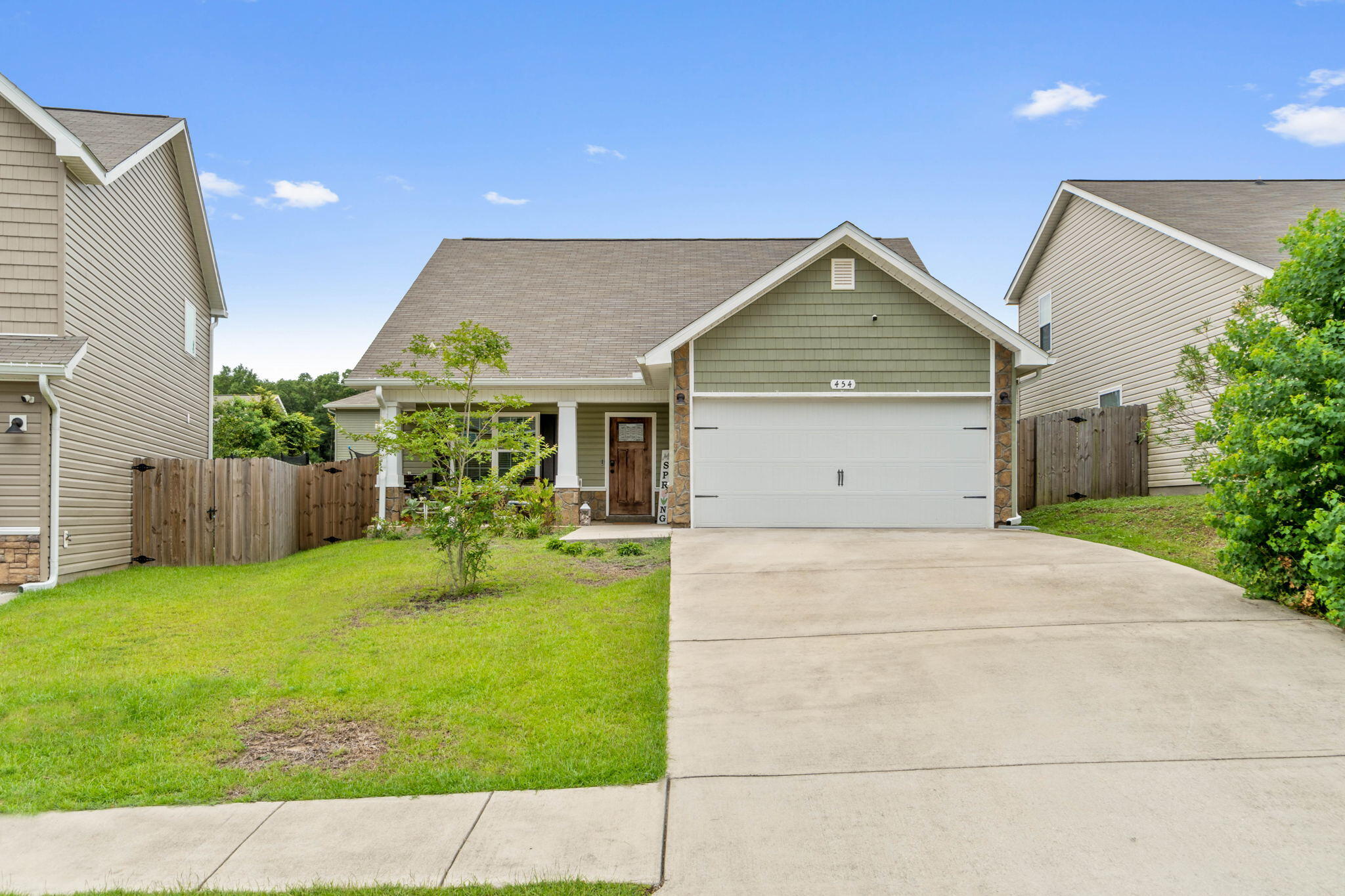 ***Home is currently Under Contract. Seller is still allowing showings and accepting backup offers.Everything about this stunning and well maintained home is ready to welcome you! Walk in through the keyless-entry front door and be greeted with beautiful flooring that leads to a spacious living room that seamlessly transitions to the dining area, an inviting breakfast bar and gorgeous kitchen with white cabinets and stainless steel appliances. For ultimate privacy, the master suite is located on the first level of the home and boasts a decorative ceiling fan, a spacious master bathroom that has been freshly painted, double vanity, garden tub, stunning light fixtures, separate shower and walk-in closet. On the second level you will find three spacious bedrooms,
