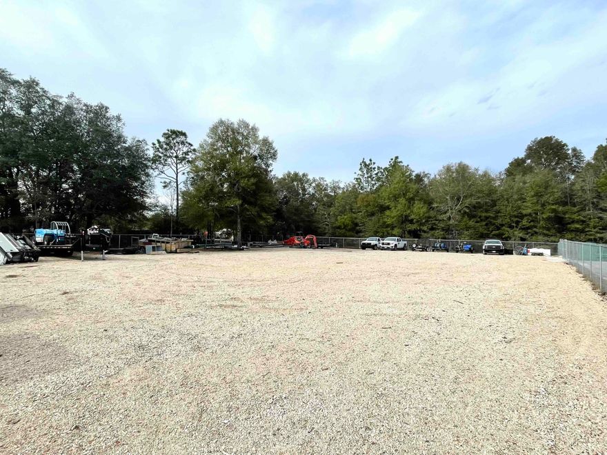 Conveniently located 3/4 of a mile south of I-10 at exit #45 which is between Milton and Crestview FL. Approximately 1.5 +/- acres of light industrial lay down yard available in Holt, FL with easy access to Interstate 10. The land is high and dry-owner is in the process of surveying, fencing and graveling the area that is available. First picture is an example of another (on property) lay down yard for a tenant..