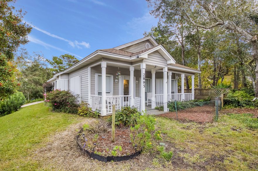 Florida Cottage in Seagrove 2nd Addition. Corner lot facing Highway 395 and side street is Seagrove Village Drive. Three Bedrooms, two full baths, well maintained and excellent rental. Nice yard with room for a pool, a two car carport and storage or workshop room. Only two blocks from the beach access, no HOA fees.