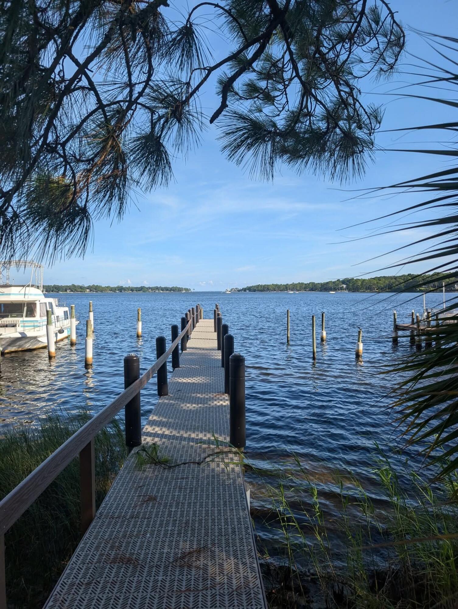 Welcome to Water Oaks and get ready to enjoy this great community and the waters of Boggy Bayou! This one owner townhome is waiting for your personalization of this vintage ''As Is'' property. With one bedroom and bath downstairs and two bedrooms and two baths up, it is great for for everyone! Update to your taste and kick back and enjoy views to Destin! You share a pier dock and the right side ready for your boat or water toys. Enjoy the Community pool, Gazebo, Tennis/Pickleball/Basketball court and lots of natural space. Also boat, RV and Trailer parking can be available! just a block or two to Post 20 and Blue Collar Cafe or Ruby Tuesdays and more. Just a few minutes to Eglin, short drive to Hurlburt, Duke and 7th Group. Great home needing updating and personalization.