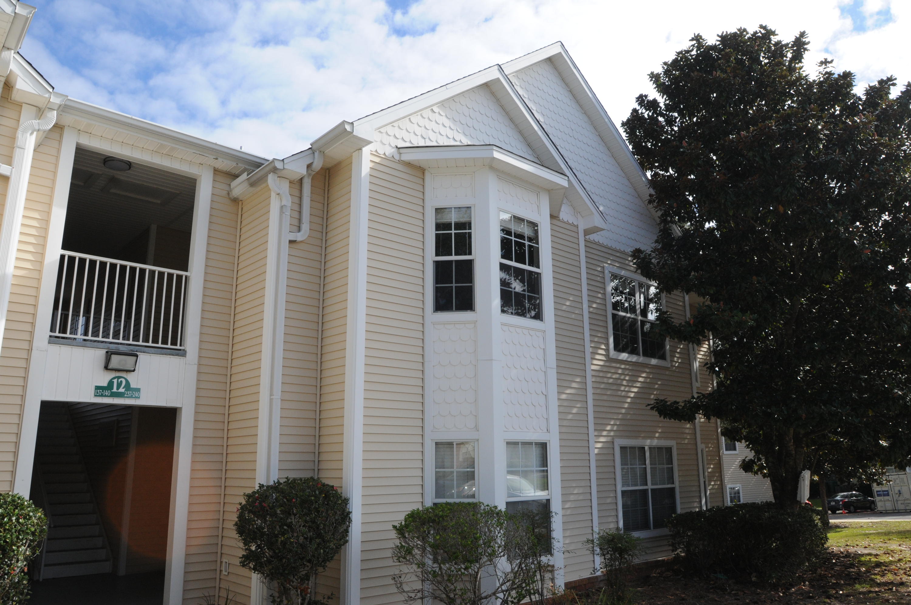 Central Niceville spacious VA approved condo complex, THE OAKS. This 2 bedroom/2 bath second floor unit is sparkling clean move in ready with cathedral ceilings, updated lighting fixtures, new knobs, new stainless steel dishwasher and 2015 HVAC. Light and bright, walking distance to Niceville High School, Ruckel Middle School, Niceville Library and new Senior Center. Complex features a pool, gazebos throughout, cable, landscaping, exterior insurance, sewer, recycling and trash pick up. Centrally located near Northwest Florida State College, Eglin and 7th Group Compound. Great investment property or easy living. Call today before it is gone!