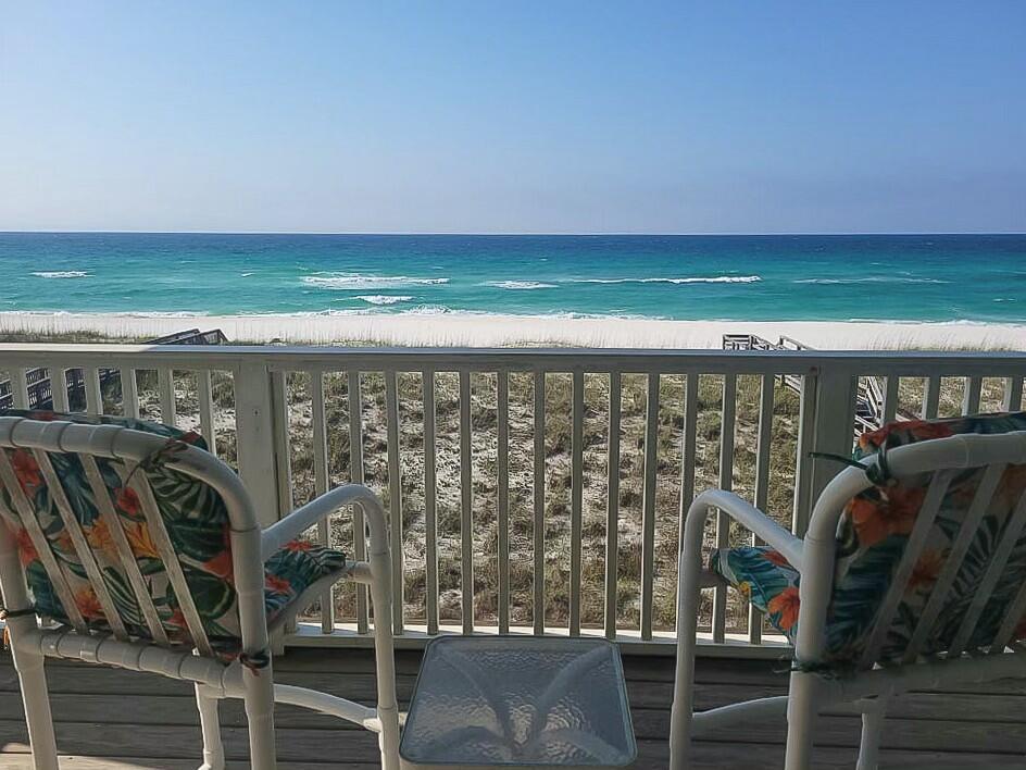 This Gulf front beach is a slice of paradise! With its fully furnished 4 bedrooms and 3.5 bathrooms, it's perfectly set up for comfortable living and hosting guests. The large decks overlooking the Gulf of Mexico must offer spectacular views, especially with the emerald green water and white sand below. And having an outdoor shower and closet for beach gear makes it so convenient to enjoy the sandy shores. The main floor bedroom and full bathroom add versatility, and the open concept kitchen, dining, and living area must be fantastic for gatherings, especially with the stunning water views. The gourmet kitchen with granite countertops and beautiful wood cabinets sounds like a dream for any chef or entertainer. Upstairs, the additional bedrooms and bathrooms provide ample space for family This Gulf front beach is a slice of paradise! With its fully furnished 4 bedrooms and 3.5 bathrooms, it's perfectly set up for comfortable living and hosting guests. The large decks overlooking the Gulf of Mexico must offer spectacular views, especially with the emerald green water and white sand below. And having an outdoor shower and closet for beach gear makes it so convenient to enjoy the sandy shores. The main floor bedroom and full bathroom add versatility, and the open concept kitchen, dining, and living area must be fantastic for gatherings, especially with the stunning water views. The gourmet kitchen with granite countertops and beautiful wood cabinets sounds like a dream for any chef or entertainer. Upstairs, the additional bedrooms and bathrooms provide ample space for family

the washer/dryer hook-up near the master suite adds convenience. The spacious balcony off the master suite is undoubtedly a highlight, offering a serene spot to enjoy both sunrises and sunsets over the Gulf.
Overall, this beach home seems like a haven for relaxation and coastal living, offering the perfect blend of luxury and comfort in a breathtaking setting.