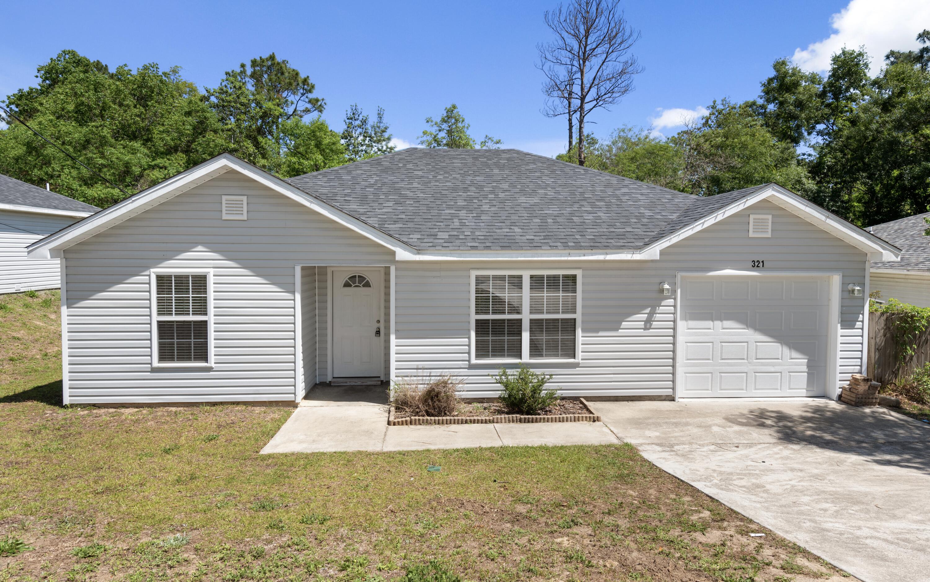 Great starter home or investment property in South Crestview! This home features 3 bedrooms and 2 baths, vaulted ceilings, stainless steel appliances and a private back yard.