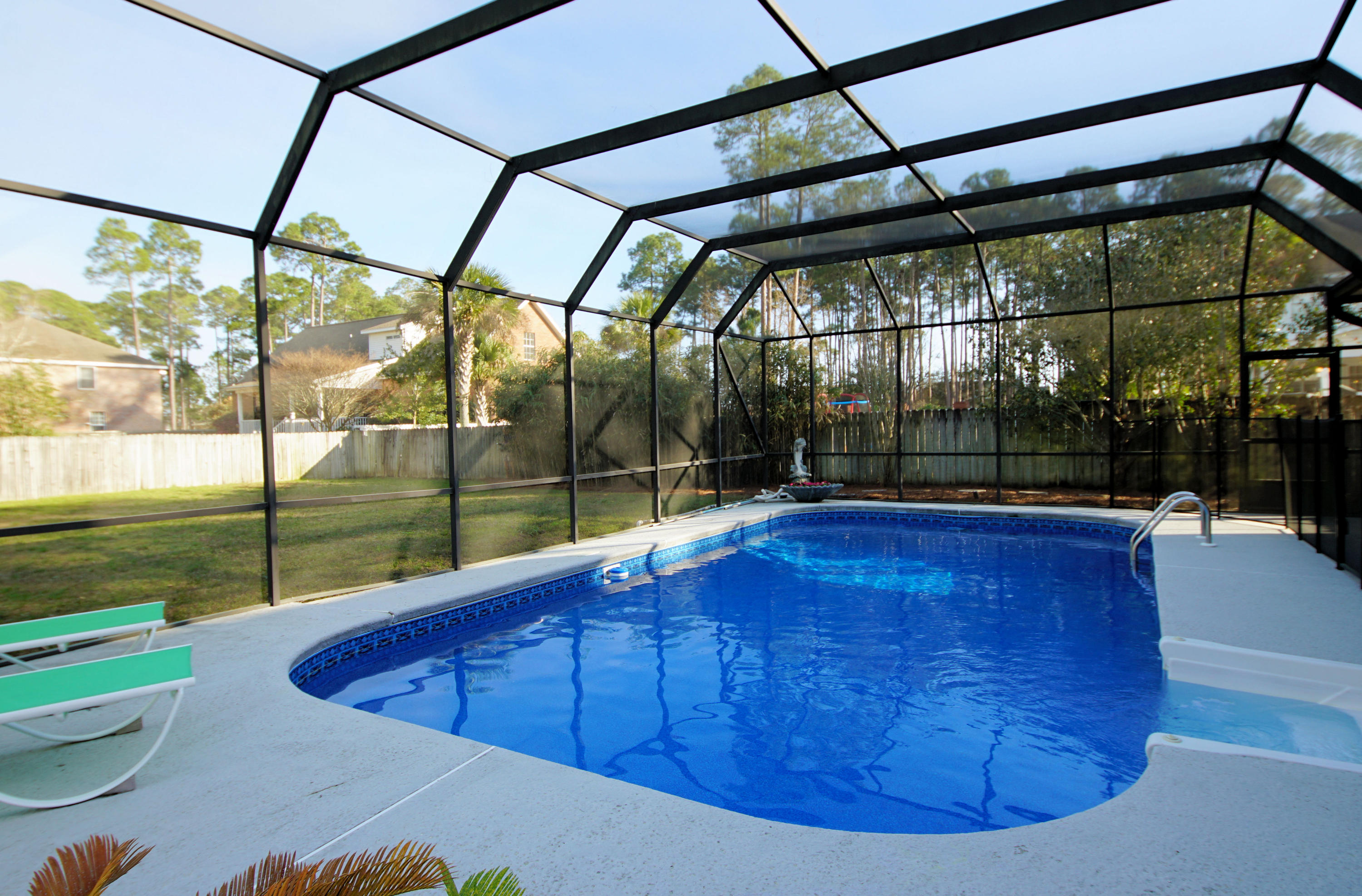 PRICED BELOW RECENT APPRAISAL!! Lovely 3bed/2.5bath brick pool home in Niceville's beautiful Dana Pointe, w/ boat launch & bay access. Lovingly maintained, this home has so much to offer! Cathedral ceiling with skylights over entry and family room provides abundance of light and open feel. Remodeled open kitchen/family room divided by huge island w/ breakfast bar, slide-out spice racks & lots of extra storage/cabinet space. This eat-in kitchen has been recently upgraded: w/ tall dark wood cabinets, stainless appliances, counter-tops, double-oven, work space and recessed & pendant lighting. Off the kitchen is access to over-sized garage with loads of storage options and utility room with cabinet storage. Large living area sports gas fireplace, cathedral ceiling &