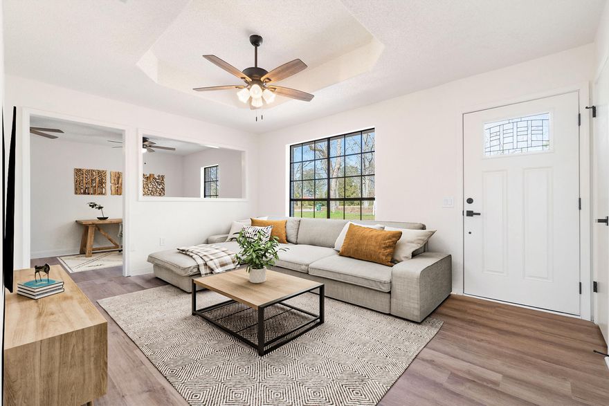 This beautifully updated single-family home on a 0.47-acre lot features 1,400 square feet of living space with three bedrooms and one and a half bathrooms. Recent upgrades include: New Luxury Vinyl Plank (LVP) flooring in common areas and bathrooms, with new carpet in bedrooms. Fresh interior doors, hardware, and lighting throughout. Kitchen is complete with new cabinets, countertops, backsplash, and appliances. Renovated bathrooms with new tile surround in main shower/tub, modern vanities, sinks, toilets, and plumbing. New HVAC system, water heater, and new roof, New exterior, and sliding door. Updated outlets and switches add safety and convenience. This property is convenient to the 7th SFG and Duke Field.