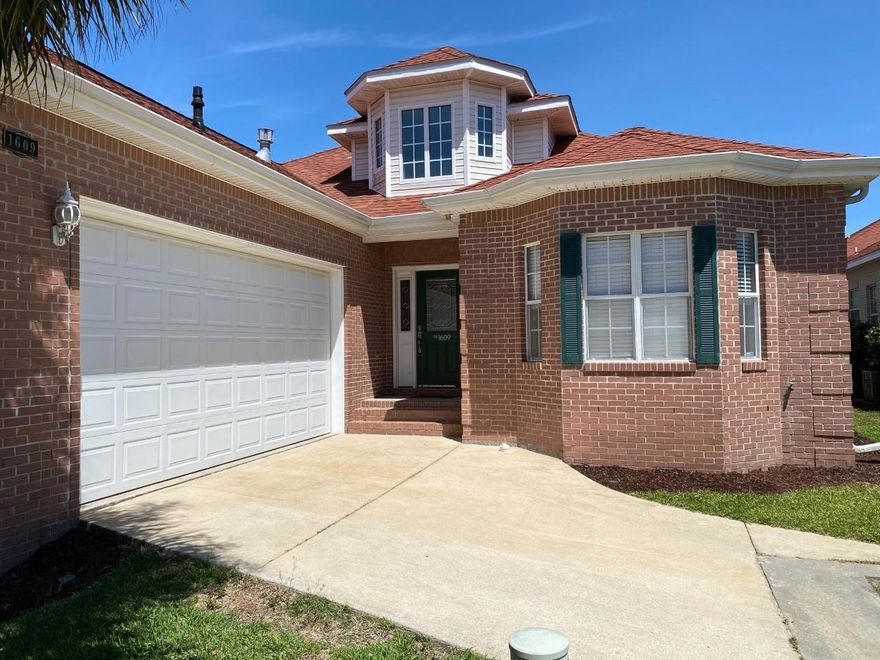 This lovely 3/2 home welcomes you with a soaring foyer ceiling & tray ceilings in the dining room. The kitchen features tall cabinets, under-cabinet lighting, Corian counters, new dishwasher & disposal installed 2019. The kitchen overlooks the family room featuring a custom tiled gas fireplace, built-in shelving, wet bar w/wine cooler, recessed lighting, vaulted ceilings and wood-look tile flooring. Large master bedroom, spacious master bath w/separate vanities, shower, garden tub & walk-in closet. Spare bedrooms have lots of closet space and share a bath. A deck rounds out the fenced back yard making it great for enjoying the outdoors. All Appliances including washer & dryer convey. Tank-less Water installed 2017, New HVAC installed 2016.