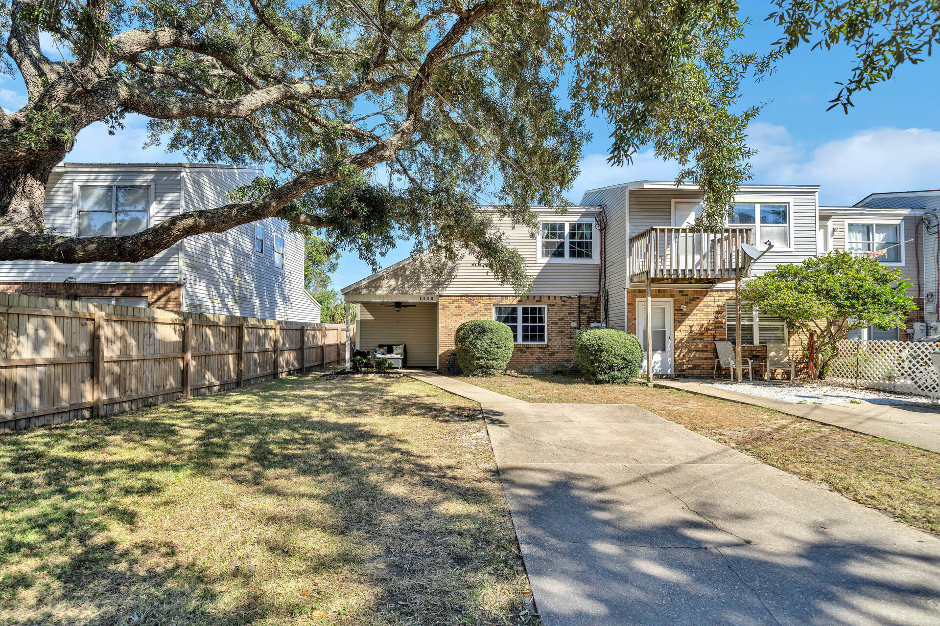 Welcome home!! This exceptional townhome is located in the heart of Navarre centrally located to area dining, shopping, activities, events and a minutes from the World's most beautiful beaches! This home consists of 3 full bedrooms, 2 full baths AND a Florida Room. The Florida Room is not headed or cooled; therefore, is not reflected in the square footage. Enjoy spending time with your family and friends outside - You'll find a well-constructed pergola with paver patio and it's equipped with a paver fireplace, a ceiling fan,  and bistro lighting! It's ready for you to make memories! While the home is centrally located, it also offers water access with Kayaks, paddle boards, or canoes at the local water launch (No motorized vehicles.) Call today to make this your new home!!