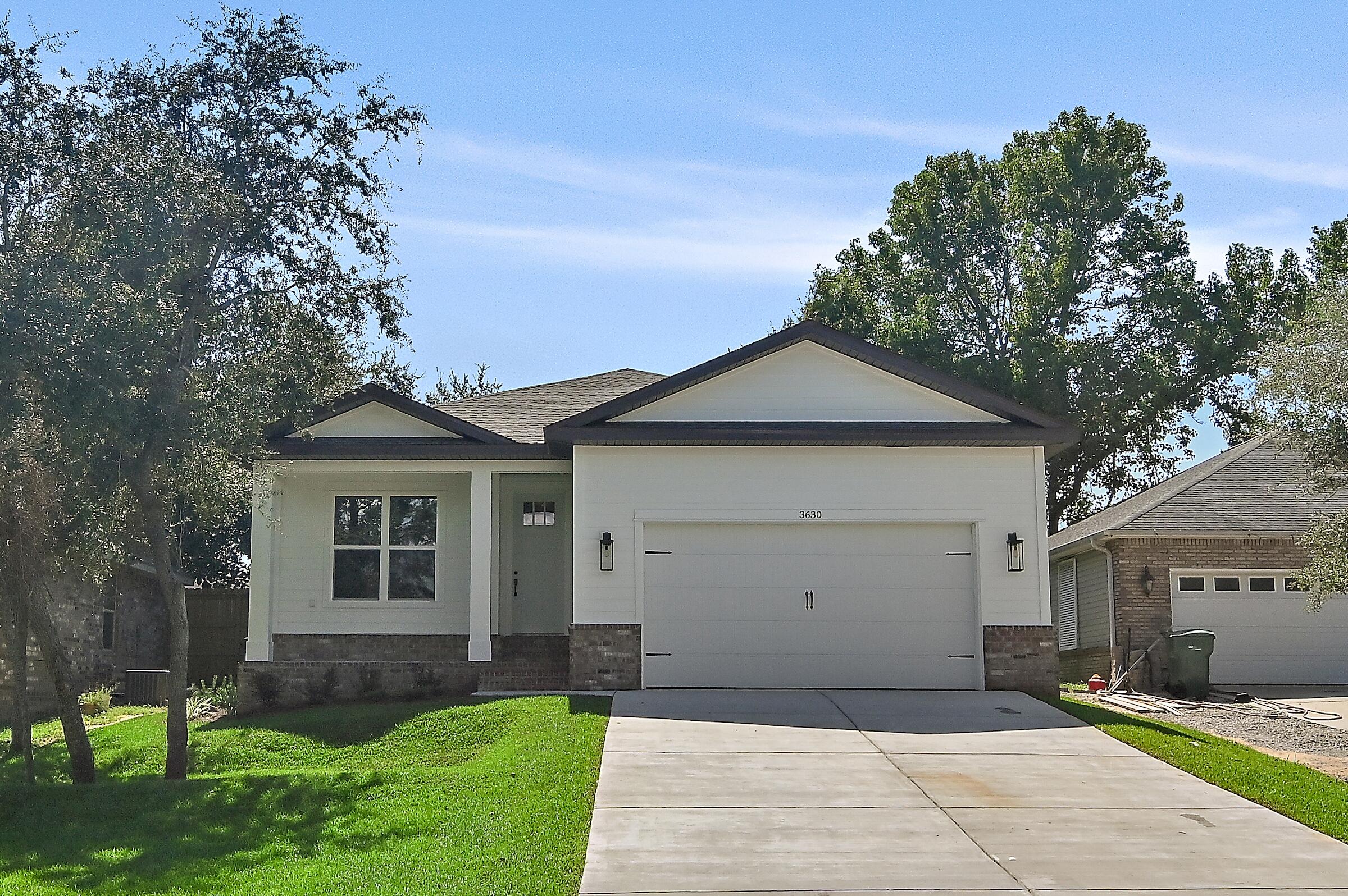 Construction is complete, bring your buyers! This brand new custom built home contains approximately 2,227+-SF featuring 4 bedrooms, 2 baths and an open floor plan. This home features custom finishes, moldings, and fixtures throughout.  The kitchen features quartz countertops, a center island, a tiled backsplash and stainless steel appliances. The home features hardwood flooring throughout, except for tile in the bathrooms.  Each of the baths feature custom tiled showers and quartz vanity tops.  This home is located in downtown Destin within close proximity to Harborwalk, Joe's Bayou boat launch and all the recreational activities and festivities that Destin has to offer.