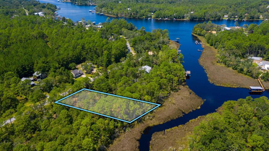 WATERFRONT LOT  Rare waterfront lot on Mallet Bayou with large space to build your dream home! There is a perfect mix of oak trees and pine trees throughout the property. 80+ feet of water frontage.  This lot is also in close proximity to U.S. Hwy 331 and the new county park/Boatramp.  Call to schedule your private showing.