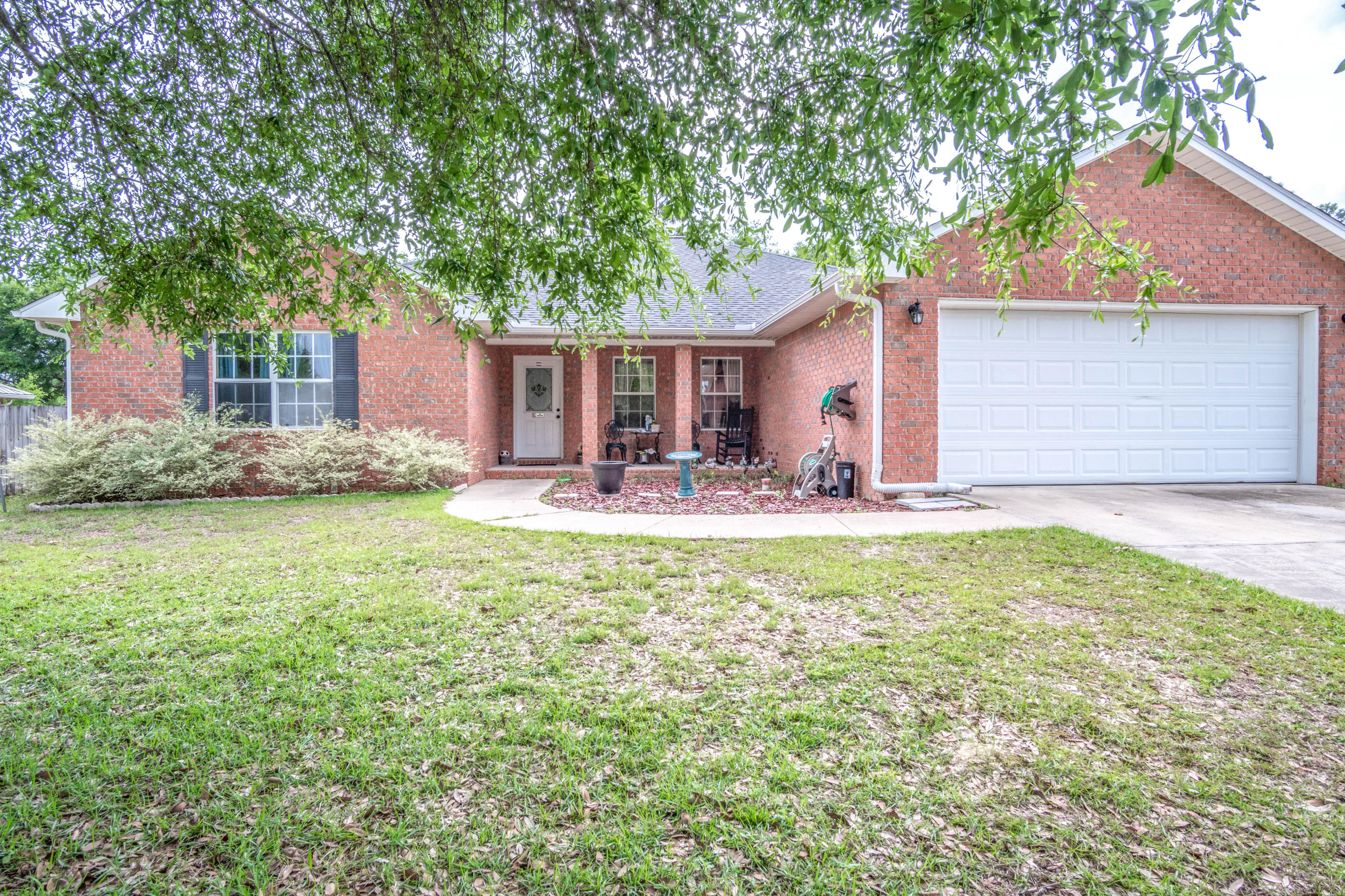 ***STOP YOUR SEARCH!*** This four bedroom, two bath, split floorplan, two car garage has everything you need!! Upgrades throughout including No Carpet- Tile in wet areas and laminate in other areas! Master bath has a CUSTOM TILED shower and a LARGE Soaking tub PLUS a walk in closet! UPGRADED Kitchen appliances including a brand NEW dishwasher and a BREAKFAST BAR! Double French doors in Huge Living room allows natural light. Lots of storage and large bedrooms! Fenced in, Level backyard makes it perfect for outdoor activities. Call your favorite agent for a private tour. Buyer to verify all measurements