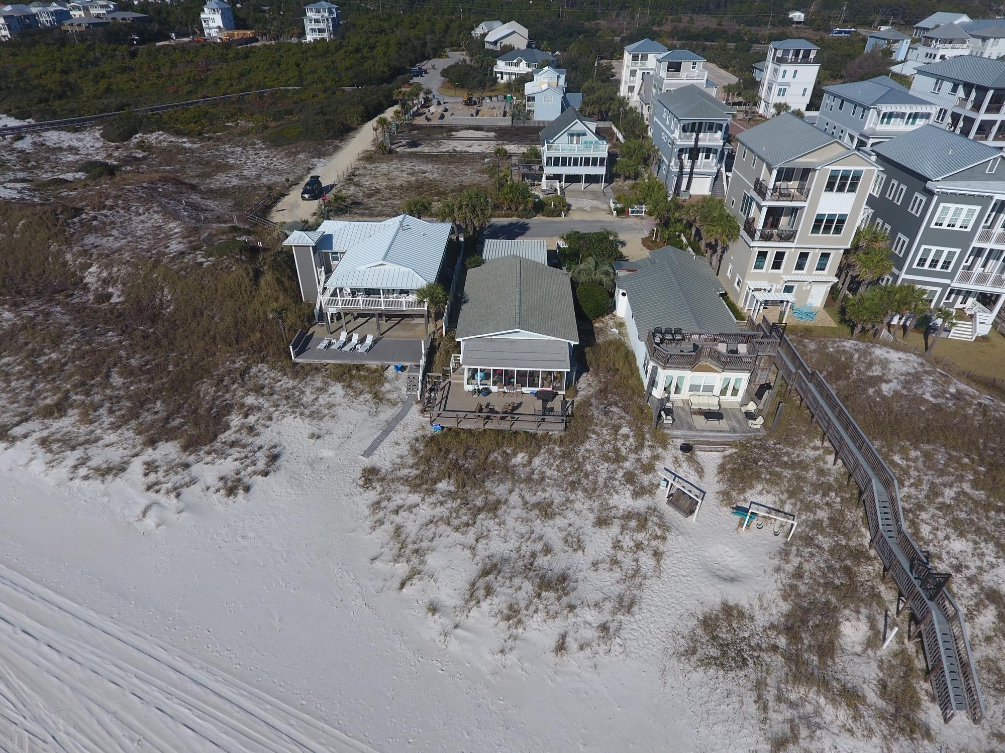 An amazing GULF FRONT Opportunity awaits! This is your chance to own 49X190 feet of private deeded Gulf front in Inlet Beach for under $2,000,000! This charming Gulf Front Florida cottage features 3 bedrooms, two baths, a large open concept living/dining area, a large sun room and ample deck space and private beach for your family to enjoy the emerald Gulf waters and white sand! This property is an amazing opportunity to own Gulf front property for personal enjoyment, an investment property or build a gulf front dream home.
