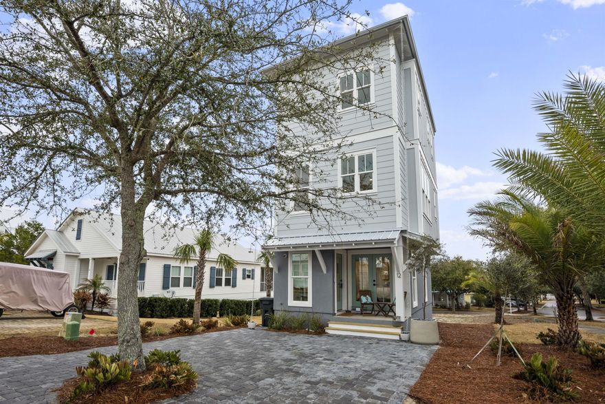 Incredible opportunity to own this exceptional upscale beach cottage within the charming gated community of The Village at Blue Mountain Beach! This private community is conveniently located right off of 30a and less then a half mile from the beach access. This charming 2 bedroom, 2.5 bathroom, 3 story beach cottage combines the best of coastal living with elegant design. This is sold mostly furnished with the exception of a few items. The first bedroom is located on the first floor with double french doors that open to front porch, laundry room and full bathroom with a double vanity. The second floor houses the full kitchen with stainless appliances, gas stove, and farmhouse sink, porcelain tile and with seating at the spacious counter. The kitchen opens to the great room with open space