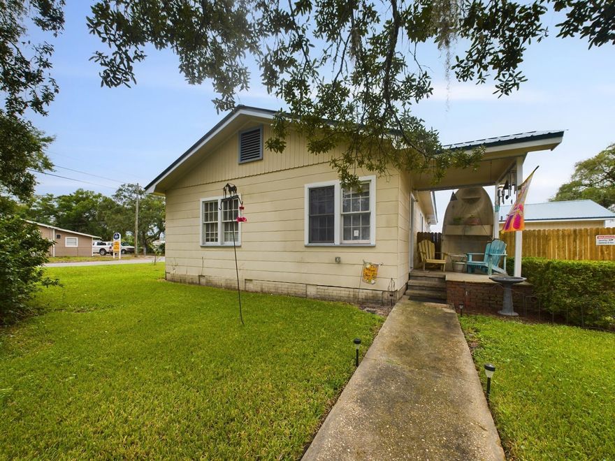 Discover this delightful 3-bedroom, 1-bathroom home in Fort Walton Beach, perfectly situated on a corner lot near the picturesque Cinco Bayou Bridge. This property is a blend of comfort, convenience, and versatility with unique features. This home offers an attached 1 car garage, a detached workshop with a 1 car garage door + a detached carport. Enjoy a refreshed and modern bathroom, meticulously renovated to offer both elegance and functionality. Keep your lawn lush and green with the built-in sprinkler system that draws from the well, ensuring easy maintenance of your outdoor space! With mixed zoning use, this property provides flexible opportunities for residential living or potential business ventures.