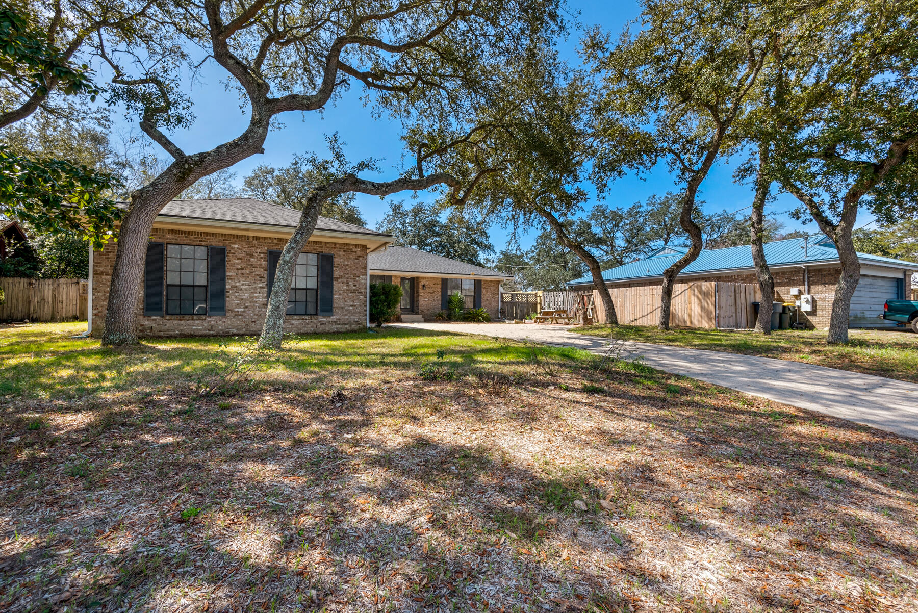 MOVE-IN READY!! Completely renovated from top to bottom! All brick exterior, new and upgraded kitchen cabinets with soft-close drawers, new appliances, new granite countertops, new recessed lighting, new dining room/kitchen/bathroom light fixtures, new vinyl plank (wood look) flooring with upgraded cushion backing, new wood pantry shelves, newer roof, new garage door and frame, new attic pull-down stairs, new gutters, new skylights. Ceiling fans throughout, extra parking spaces, large privacy fenced back yard. Space blanket in attic. Gazebo and yard building convey without warranty. All dimensions and information herein is deemed reliable, but should be verified by buyer.