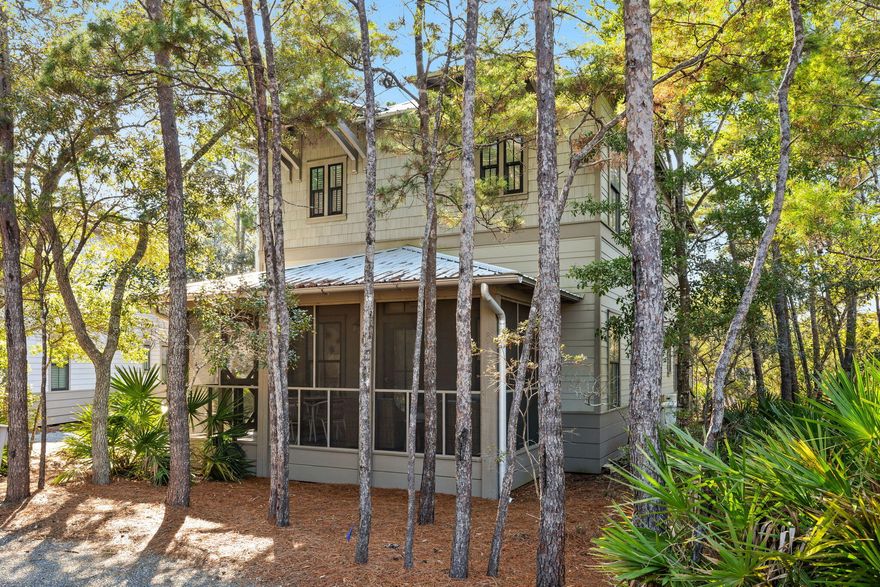A beautifully furnished single family home in Magnolia Cottages along 30A, offering rare space, privacy, and exceptional rental history in one of South Walton's most desirable beach communities. This property features 4 bedrooms, 4.5 bathrooms, and 2,160 heated and cooled square feet on one of the largest lots in the neighborhood. Built in 2018 providing modern construction and ensuite bathrooms in every bedroom, a standout feature for comfort and rental demand. The main level features an open floor plan with abundant natural light, and an ensuite bedroom. The kitchen includes quartz countertops, stainless steel appliances, a large kitchen island, and soft close cabinetry. Outdoor spaces include a screened in porch, an outdoor fire pit area, and a peaceful wooded backdrop that enhance the natural preserve setting. Conveying fully furnished with a golf cart, offering easy access to nearby dining, beach access points, and the best of Scenic 30A. 
Positioned directly across from the resort-style community pool, residents and guests enjoy quick access to plentiful seating areas surrounded by native coastal landscaping. 
Magnolia Cottages provides a deeded beach access, green space and a calm, natural setting. Ideally located near Waterhouse Provisions & Bottle Shop, Rosemary Beach, Alys Beach, and just 1 mile from The Big Chill, placing guests close to popular 30A attractions while still offering a quiet retreat.