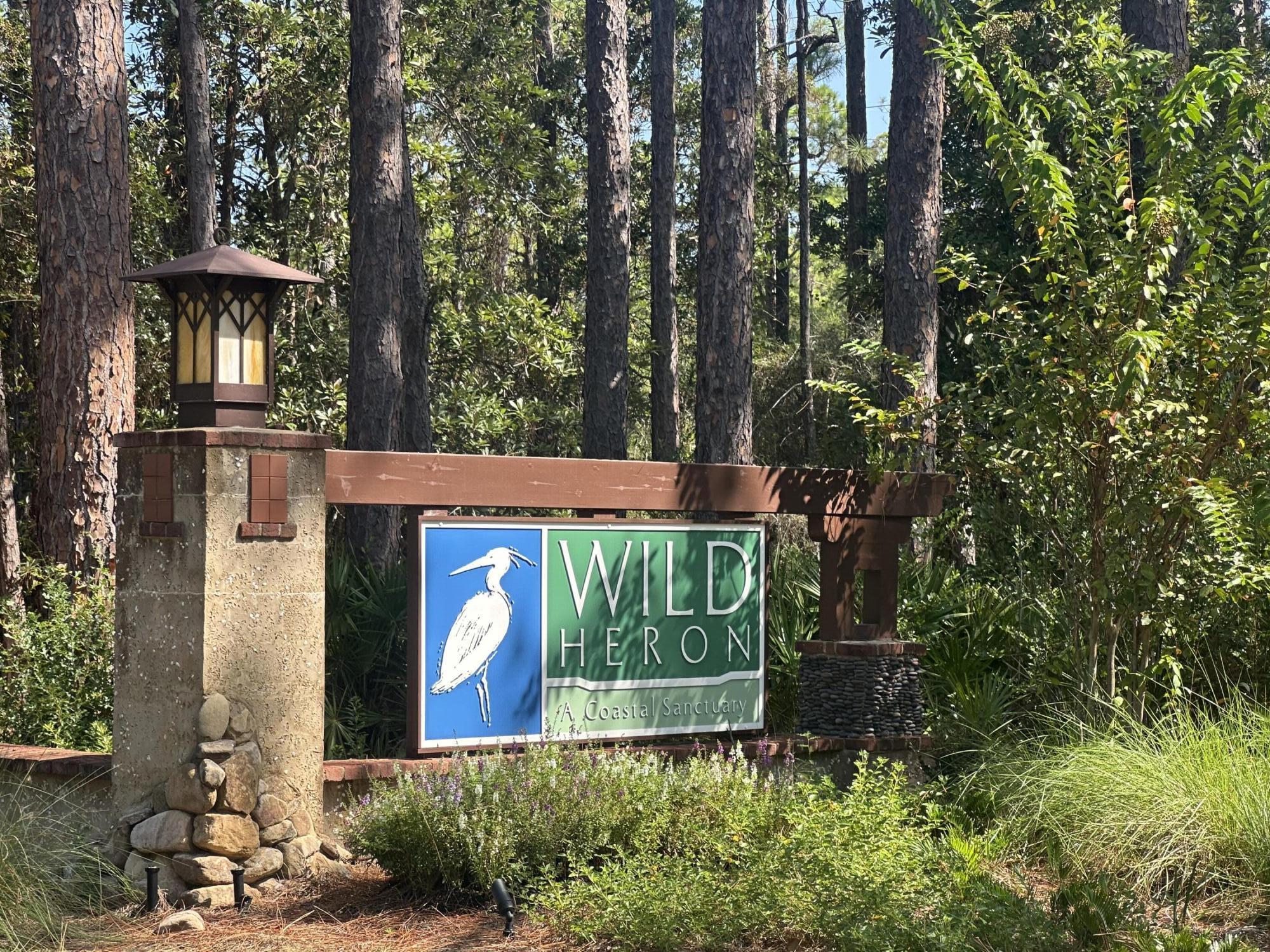 Premium Lake Powell Homesite in Wild HeronDo not miss the opportunity to own this rare and desirable homesite in the gated Wild Heron community, perfectly suited for those seeking a serene and luxurious lakeside lifestyle. This homesite offers a truly unique setting, with front, back, and south side views of Lake Powell--Florida's largest coastal dune lake--paired with the natural privacy of majestic old oak trees and captivating water vistas.Wild Heron is celebrated for its coastal craftsman charm and is home to Greg Norman's renowned Shark's Tooth Golf Course, with a new course by Davis Love III on the horizon. A Watersound Club membership provides access to these elite golfing experiences, making this property an ideal choice for golf enthusiasts and nature lovers alike.... Community include 24-hour security, lakeside grill and fire pit, swimming pool, fitness center, and scenic nature trails. Located on the west end of Panama City Beach, Wild Heron is minutes from Pier Park and the 30A area. Short-term rentals are prohibited, ensuring a peaceful and private neighborhood atmosphere***Buyer is responsible for personally verifying details about this Any information contained in this listing is believed to be accurate but not guaranteed.***