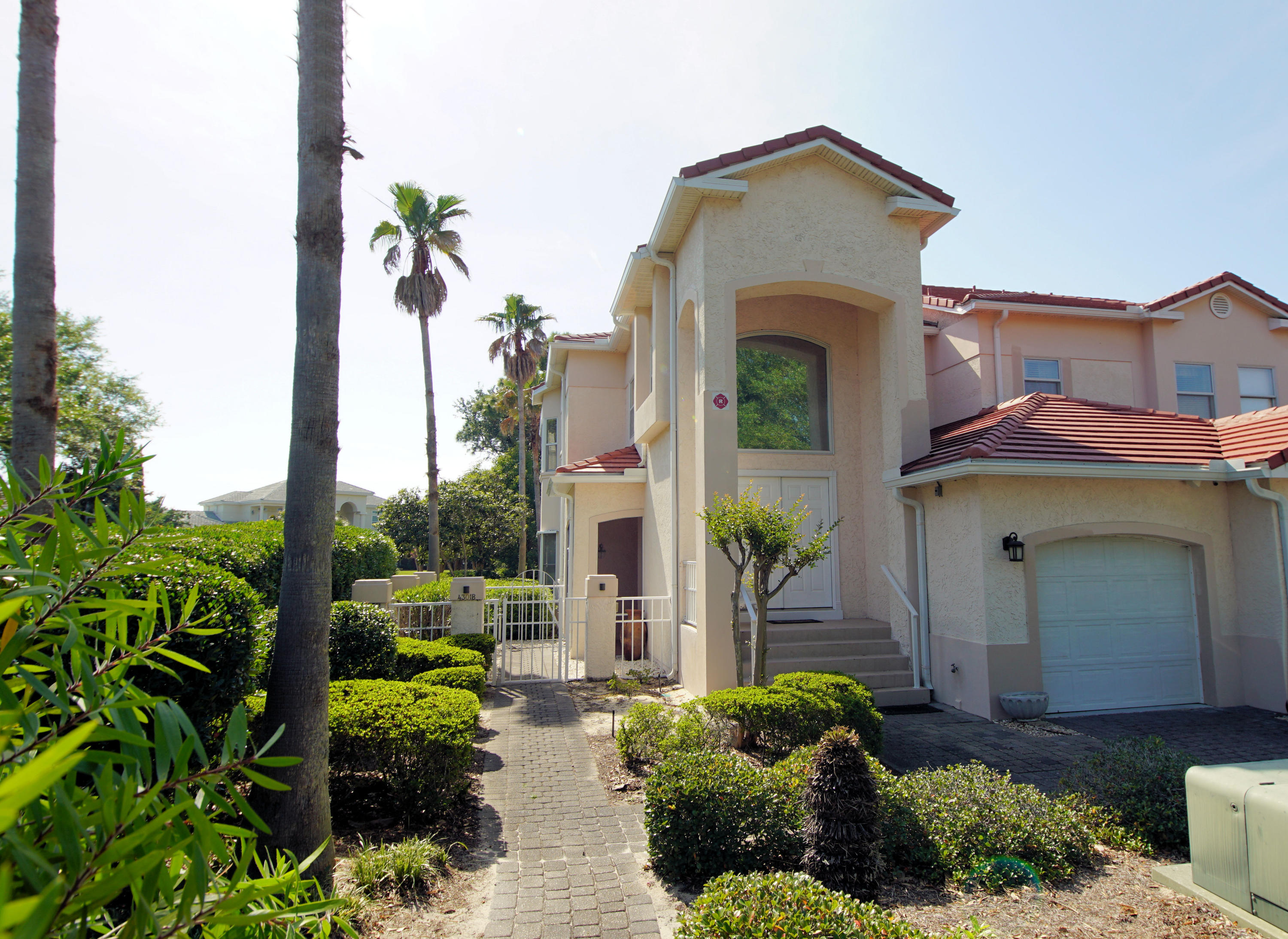 Lovely 3 bedroom end unit coach home in the private community of Sunset Beach .This second floor unit comes with a single car garage and a screened porch with views of the fairway.Inside there is a large open plan living room and dining room. The kitchen has a breakfast bar and a large eat in area with a bar ''passthrough'' to the living area that adds to the openness of the floorplan. The large master suite has golfcourse and bay views as well as a private door to the balcony.There is a community pool,beach and clubhouse available to residents and the landscaping is maintained by the HOA. Pets may be allowed with owner approval and a non refundable pet fee. This is a NON smoking unit and all all applicants 18 or older must complete an application.
