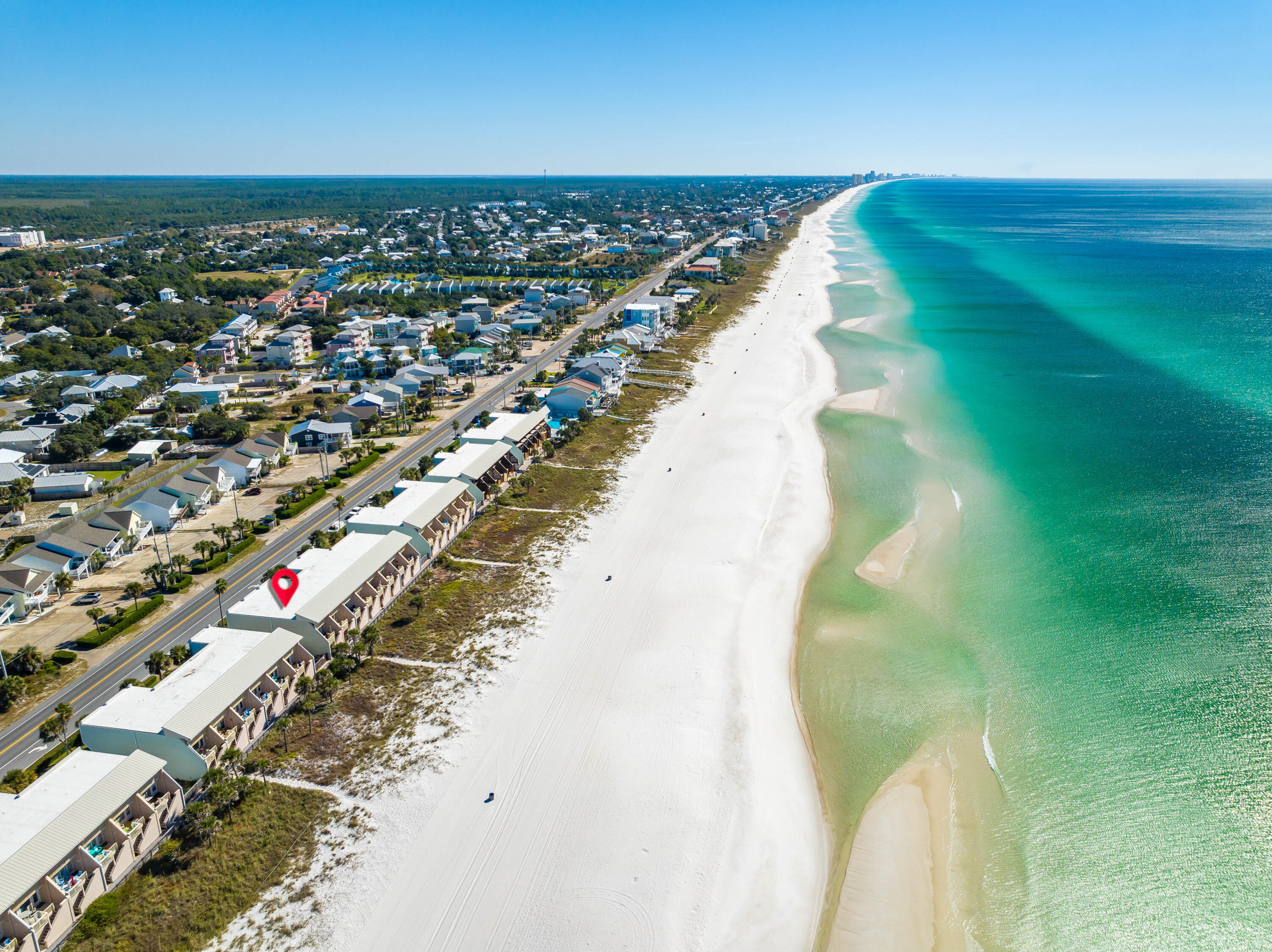 Rare opportunity to own the actual beach with this GULF FRONT 3 bedroom townhome near Carillon Beach and 30A on the WEST END of the beach. Complete with a GULF side Master bedroom boasting panoramic views of the crystal waters with a GULF FRONT balcony, updated Master walk-in shower with custom tile and frameless glass door, huge walk-in his and hers closet, new LVP flooring throughout, custom plantation shutters and a private garage with plenty of storage. Additional features include a SimpliSafe security system, Solar Screen/Hurricane shutter system on both main and upper levels for solar and hurricane protection benefits. This townhome is environmentally friendly with a Geothermal condenser and air handler upgraded to a 4 ton unit; saves big on energy!