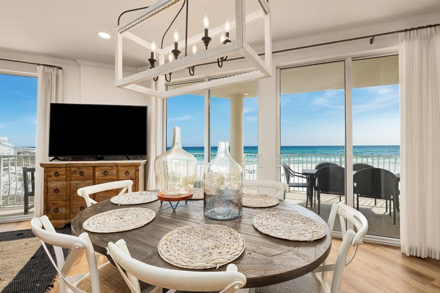 Few condos can match this gem, which boasts three full bedrooms all with ensuite baths, gulf views and direct balcony access. It's also one of the few condos in the building with direct-facing gulf views from its third-floor location and a deeded covered parking space. Step inside this fully updated unit to appreciate the remarkable fixtures & finishes that draw you in from the moment you set foot in the foyer. Light wood flooring, shiplap walls & fresh neutral decor entice you through the bright open living space to a series of floor-to-ceiling doors framing breathtaking gulf views. The expansive wraparound balcony is perfect for entertaining with panoramic views along the Emerald Coast. Designed with the ideal host in mind, the large custom kitchen has new veined quartz countertops with waterfall edges, grey tile backsplash, stainless appliances and a wine fridge for serving perfectly chilled drinks. Draw up a seat at the island breakfast bar for drinks and snacks while the cook conjures tasty meals. The grand master suite includes a quiet sitting area and enlarged walk-in closet. The adjoining ensuite bathroom wows with a double vanity, glass shower enclosure and an oversized oval tub for heavenly soaks after a busy day shopping or playing golf. There's a second guest suite with a king sized bed and a bunk room for five to accommodate visiting family and friends. Head over the dunes to the beach via the level private boardwalk. Start the day with a morning stroll with wildlife or rent kayaks and paddleboards from the onsite rental company. The condo comes with dedicated parking, gated pool and beach access, available storage lockers and closets, and a host of sports and top-notch amenities. Two gulf-front pools (one heated), hot tub, a sauna, steam room, fitness center, pickleball and tennis court provide endless opportunities for an active outdoor lifestyle. After a fun-filled day, return to the peace and tranquillity of this beautiful home to relax with sunset drinks. Ideal as the perfect second home, this glorious beach retreat could also be a lucrative investment rental.