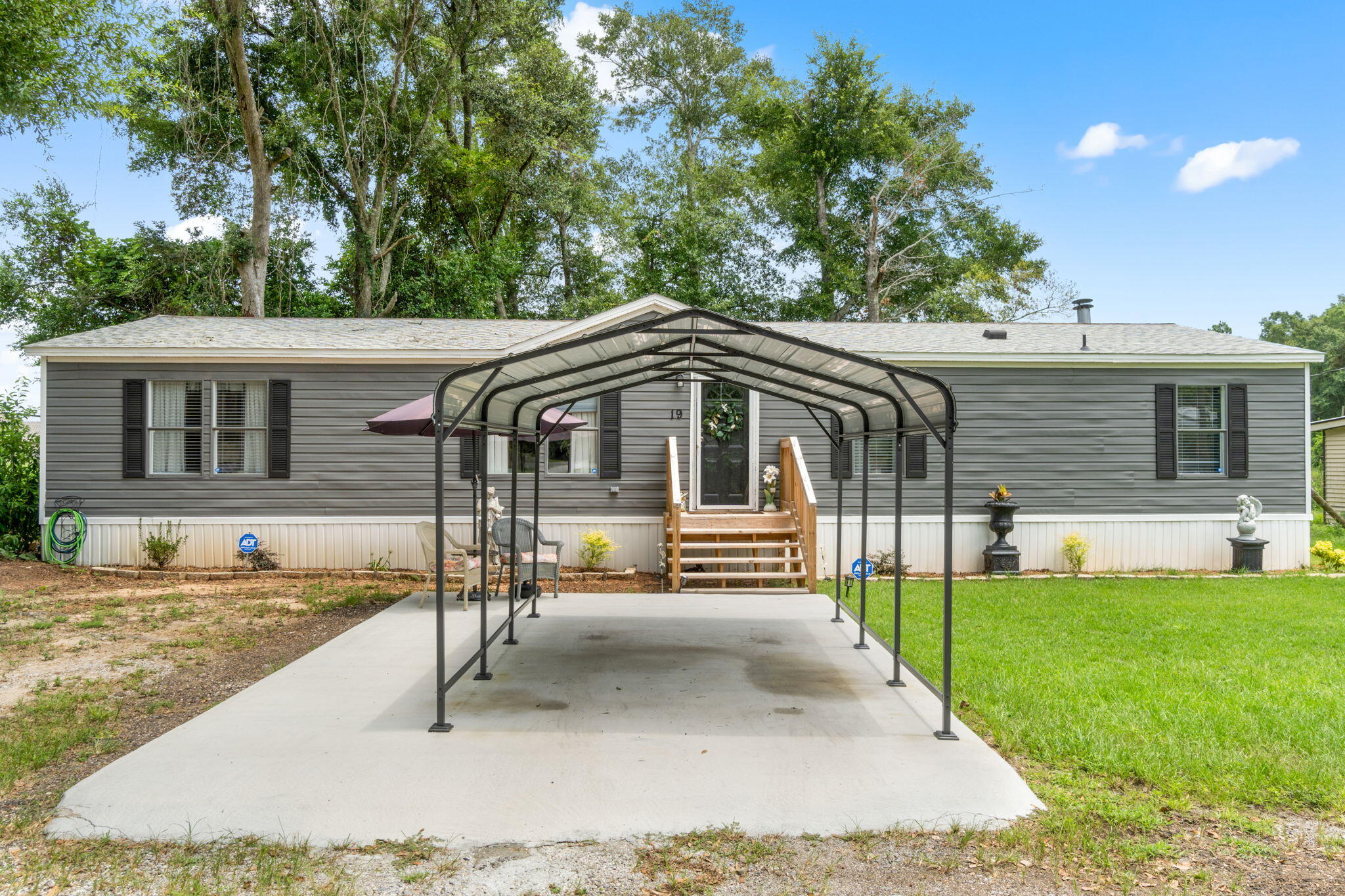 Welcome to your dream home in beautiful Pensacola, Florida! This stunning 3-bedroom, 2-bathroom manufactured home has been recently renovated, offering a perfect blend of modern comfort and classic charm. Step inside to discover a bright and airy open floor plan, featuring TWO spacious living area filled with natural light, ideal for relaxing or entertaining. The newly updated kitchen boasts sleek countertops, contemporary cabinetry, and brand-new appliances, making cooking a delight. The master suite comes with a spacious and bright private bathroom. Enjoy the convenience of a brand new carport, providing protection for your vehicles and easy access to the home. The outdoor space is perfect for enjoying Florida's sunny weather. Also located in a peaceful and tucked away community.