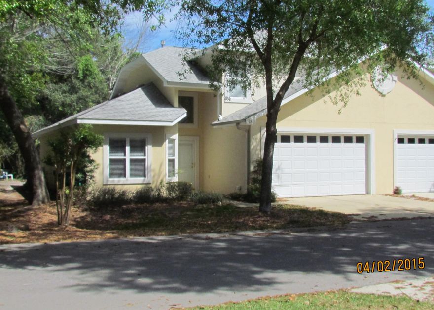 Lovely upgraded end unit. Three bedrooms, 2 and a half bath with downstairs master. Tons of extras in this convenient townhome, a short distance to the Bluewater marina. Eat in kitchen has warm wood cabinets and granite counter tops as well as newer stainless appliances and a gas stove. Living areas are all tile, bedrooms are all newer carpet. Master bathroom has separate jacuzzi tub and glass enclosed shower. All bedrooms have walk in closets. Upstairs has a walk in storage room that's heated and cooled. Downstairs off the screened porch is another storage room. Yard maintenance is handled by the homeowner's association so living is care free. From the front of the house you can see the Bay! Owner will consider as small pet that's spayed/neutered with $255 pet fee.