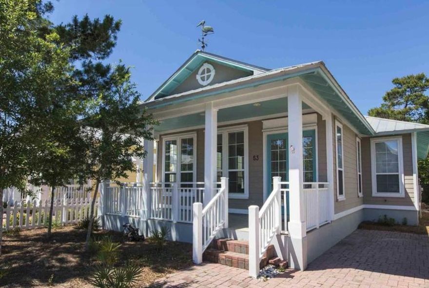 30A Gem meticulously upgraded with new exterior and interior paint, granite countertops, new lighting and designer furnishings. Beautifully maintained landscape with irrigation and privacy. Screened porch on rear plus bricked patio and a large covered front porch. Full sized laundry. Outside storage. Kitchen has wood cabinets, breakfast bar, and pantry. Large master suite with walk in closet and full bath tucked away for privacy. Two additional bedrooms. Owner is offering their beach home fully furnished and rental ready-all you'll need is your toothbrush! Cassine Village is conveniently located in Seagrove Beach and a short walk to the beach. Access to the adjoining State Forest along with three different nature walking trails and a Cypress Grove. Community pool and tennis steps away.