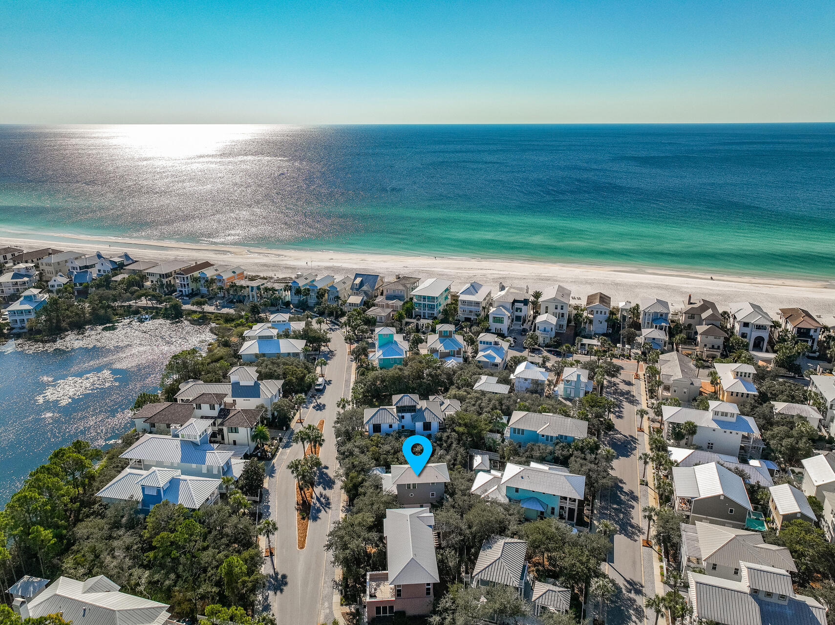 This 3 BR 2b cottage, nestled amongst a grove of native live oaks on an over-sized (almost double) lot in the heart of Carillon, close to Beach walkover and gulf-front pool, offers a rare opportunity to establish roots in Carillon Beach at a manageable price.  This is a unique chance to acquire the only 3 story carriage house in Carillon with a large lot, affording the construction of a sizable main home, with 3rd floor tower, of at least 2625 square feet, plus private pool.  (All construction subject to approval of Carillon Design Review Committee). Boasting 3900 linear ft of pristine, re-nourished, never-crowded, sugary sand beach, Carillon Beach is a quaint one-of-a-kind gated community offering 3 community pools (two heated year 'round), tennis and pickle ball courts, children's play area, full court basketball, meeting house as well as select shops and dining opportunities. The upscale shopping and restaurants of Rosemary Beach and 30AVENUE are but a 5 minute drive away. Carillon will never experience the heavy traffic associated with certain other high-end areas due to its being gated and buffered on the west by Lake Powell and the state park, allowing you to enjoy proximity to all of the many benefits of 30A with none of the burdens. Unlike several communities to the west, golf carts are permitted in Carillon. Offered for sale furnished, ''AS-IS.'' All lot, home, room dimensions are approximate and should be independently verified.  Vacation rental projection for the cottage provided by Carillon Beach Rentals is 70-72k per year.