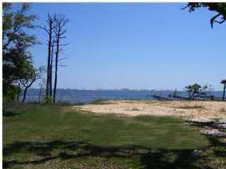 LOCAL BANK OWNED - NO WAITING! POSSIBLE 100 % FINANCING ON THIS WATERFRONT LOT IF LENDER APPROVED. If you are looking to build your soundfront home, then NOW is the time and in the PERFECT LOCATION - this is the lot you have been waiting for! Sold As Is. All information is approximate.