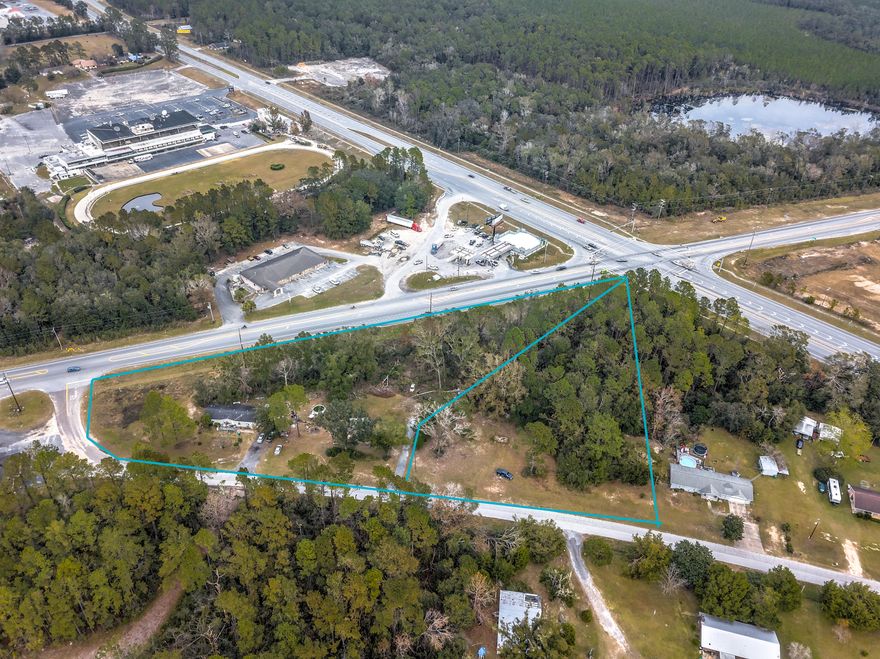 LOCATION, LOCATION, LOCATION!!! Unique opportunity to own 3.27 acres of commercial property in Ebro, FL very close to the corner of State Hwy 79 and State Hwy 20 directly across from the Ebro Motel and within view of the Ebro Dog Track and Poker Room. This would make an excellent location for a restaurant, hotel, dollar store, convenient store, gas station, or really anything to catch travelers to the beach. The Bay County International Airport is only 13 miles away and the property is only 15 miles North of Panama City Beach via State Hwy 79 that is four-laned and is a direct connection to I-10 just 30 miles North. The public boat launch is also within a mile from the property which provides access to the Choctawhatchee River and the Windswept Golf Course is less than 10 miles away. Lots