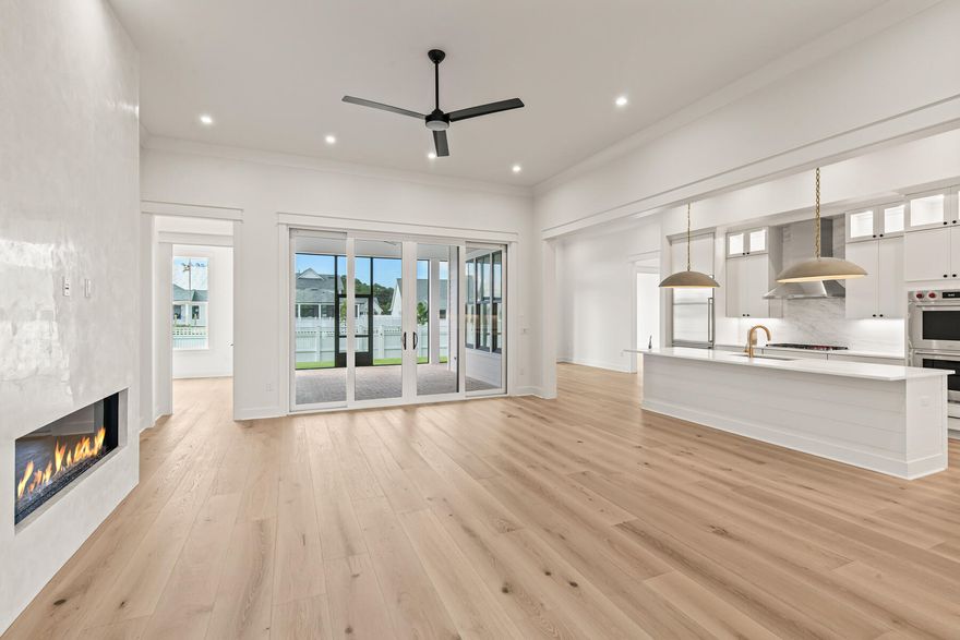 FEATURED HOME! Builder incentive applied.

Discover refined coastal living in this stunning Hampton plan by Huff Homes, a 4-bedroom, 3.5-bathroom home, thoughtfully designed with a separate study and premium finishes throughout. This single-story residence offers spacious open-concept living, a fully equipped dream kitchen, wide-plank Medallion wood flooring, and a modern 60' linear electric fireplace in the living room. The chef's kitchen features quartz countertops, a herringbone tile backsplash extending to the ceiling, and a luxury Wolf & Sub-Zero appliance package, plus a Scotsman nugget ice maker! A Butler's pantry with stacked cabinets provides additional storage and food prep space, while under-cabinet lighting enhances the ambiance and functionality. The primary suite is a retreat of its own, complemented by spa-like finishes such as a freestanding soaker tub and a large walk-in closet with ample storage. The outside of this home offers a luxurious style with upgraded black exterior windows and bronze slider doors opening up to a spacious screened back porch. The back yard offers plenty of space + pre-plumbing prepped for a future pool! Additional aspects to mention: set up for a future generator with pre wire and gas stub, pre plumbing for a whole house water filtration system + epoxy garage floor. Located in The Pines neighborhood of the Watersound Origins community, this home offers exceptional craftsmanship, a beautifully designed floor plan, and all the amenity access that comes with owning in this highly sought after community. 

The Watersound Origins community offers an unparalleled lifestyle in South Walton  exceptional amenities, notoriously friendly and welcoming atmosphere, zero short-term rentals, and close proximity to all that 30A and Inlet Beach has to offer. Enjoy the zero-entry pool, playground, sports courts, and fitness center at the Village Commons, play a round of golf or foot golf at the Origins Golf Course, or take a walk along the many miles of walking and biking trails that wind all throughout the neighborhood! The new Watersound Town Center located at the entrance to the community offers several fantastic dining options (casual and formal), medical services, Starbucks, Publix, a Pavilion that hosts events year round, and more!