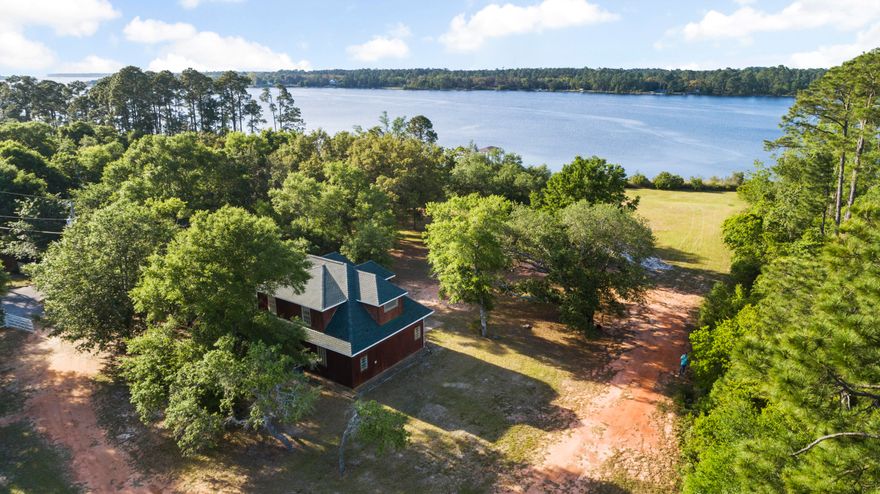 Under Contract with 72 Hour Kick Out Clause. Nearly 2 acres of pristine waterfront on the Beautiful East Bay ready for your Dream Home! Isn't this property just gorgeous! Featuring 200ft of waterfront, elevated and cleared for your home plans. Currently located on the property is nearly 2000 sqft of heated and cooled space comprised of a 3 bay garage & bathroom on the first floor along with a 1 bedroom 1 full bath apartment on the 2nd floor. Apartment features an open living room kitchen concept with a walk in pantry & breakfast bar. Tons of attic space for storage. HVAC 2018, Hurricane Shutters. You can move in and enjoy the view or start building today!