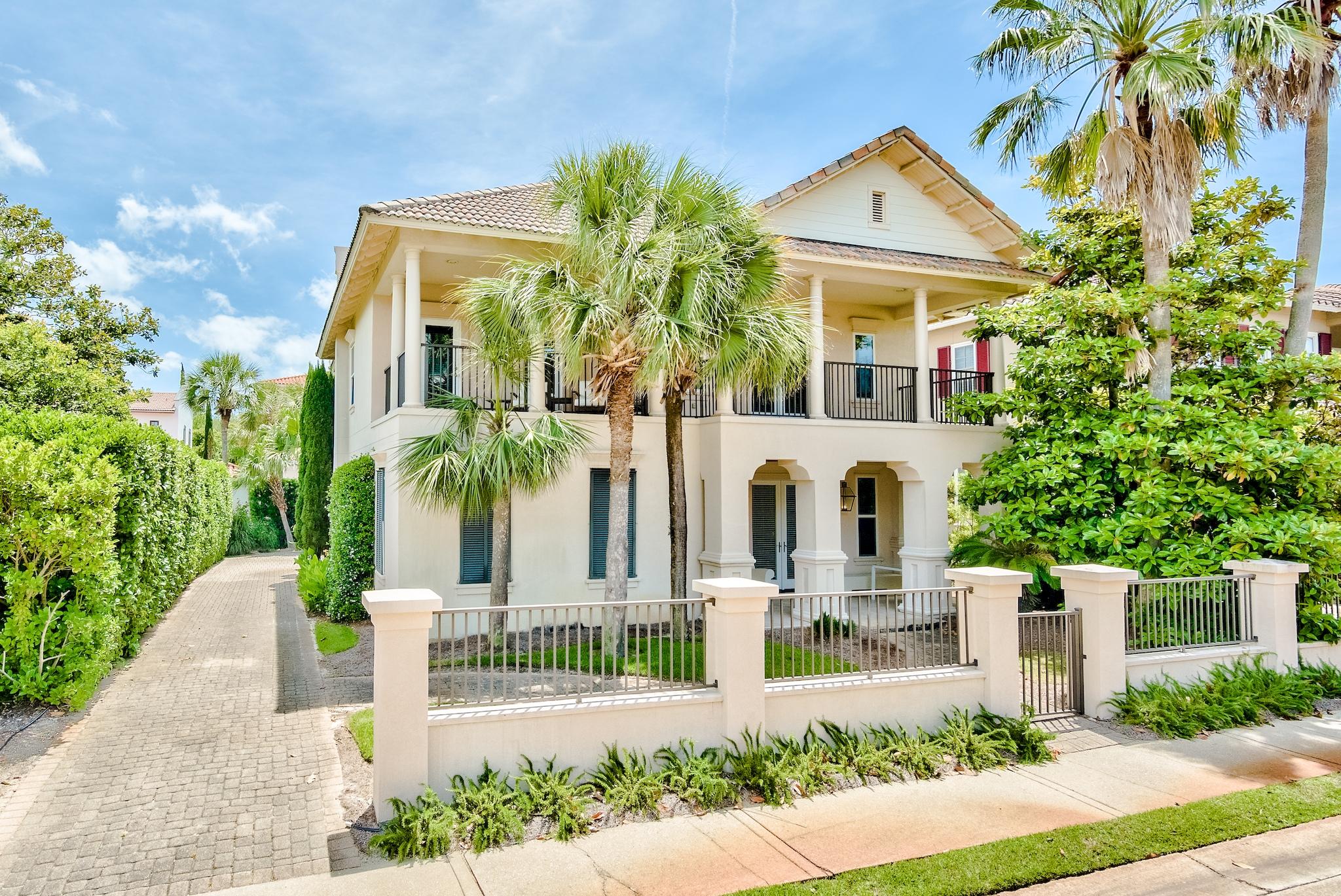 South Walton's premier gated gulf-front neighborhood, Caribe boasts sophistication with tree-lined sidewalks and friendly neighbors. Two private pools, tennis courts, and a private beach make Caribe one-of-a-kind. Things are a little quieter here - vacation rentals are allowed but the majority of homes are used as secondary or primary residences. You'll find architecture reminiscent of Charleston and New Orleans at 129 Rue Martine, with French doors, spacious bedrooms and bathrooms, and a rare detached two car garage. This 4/3 home with over 3000 sq ft of bright and airy living space flows perfectly for easy entertaining. All windows have been overlaid with hurricane film. The current bunk room easily converts to a home office. Flood insurance is not required at this address. Close to the