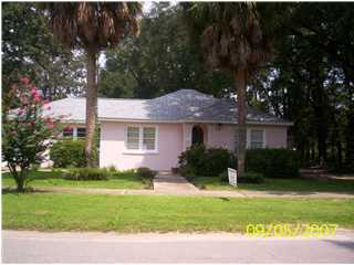 Very well maintained, vintage home close to downtown Crestview. Freshly painted, inside and out! This home has original, refinished hardwood floors and a charm that newer homes just can't offer. There is a large 2 car carport in the back yard with storage along with a very spacious covered back porch. Room sizes are approximate. No pets are allowed. Tenant will be required to carry renters insurance and show proof of such prior to occupancy.