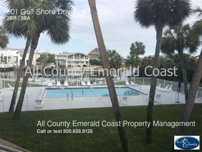 Beautiful townhome on Destin's Holiday Isle - quiet area but close to all of the fun and activity. - Isla Blanca, a 19-unit townhome community; friendly people who love their 'little piece of Paradise' - Interior Plantation Shutters, substantial energy cost savings - Beautiful patio looking out onto peaceful water canal; sunrise views - Swimming Pool; weekly cleaning service provided with rent - Pristine landscaping; weekly service provided with rent; beautiful yard to play/relax Owner pays for trash, landscaping, pool cleaning, dock fees, and HOA fees. Renter pays for gas/electric, cable/internet, and water/sewage. No Pets Please!