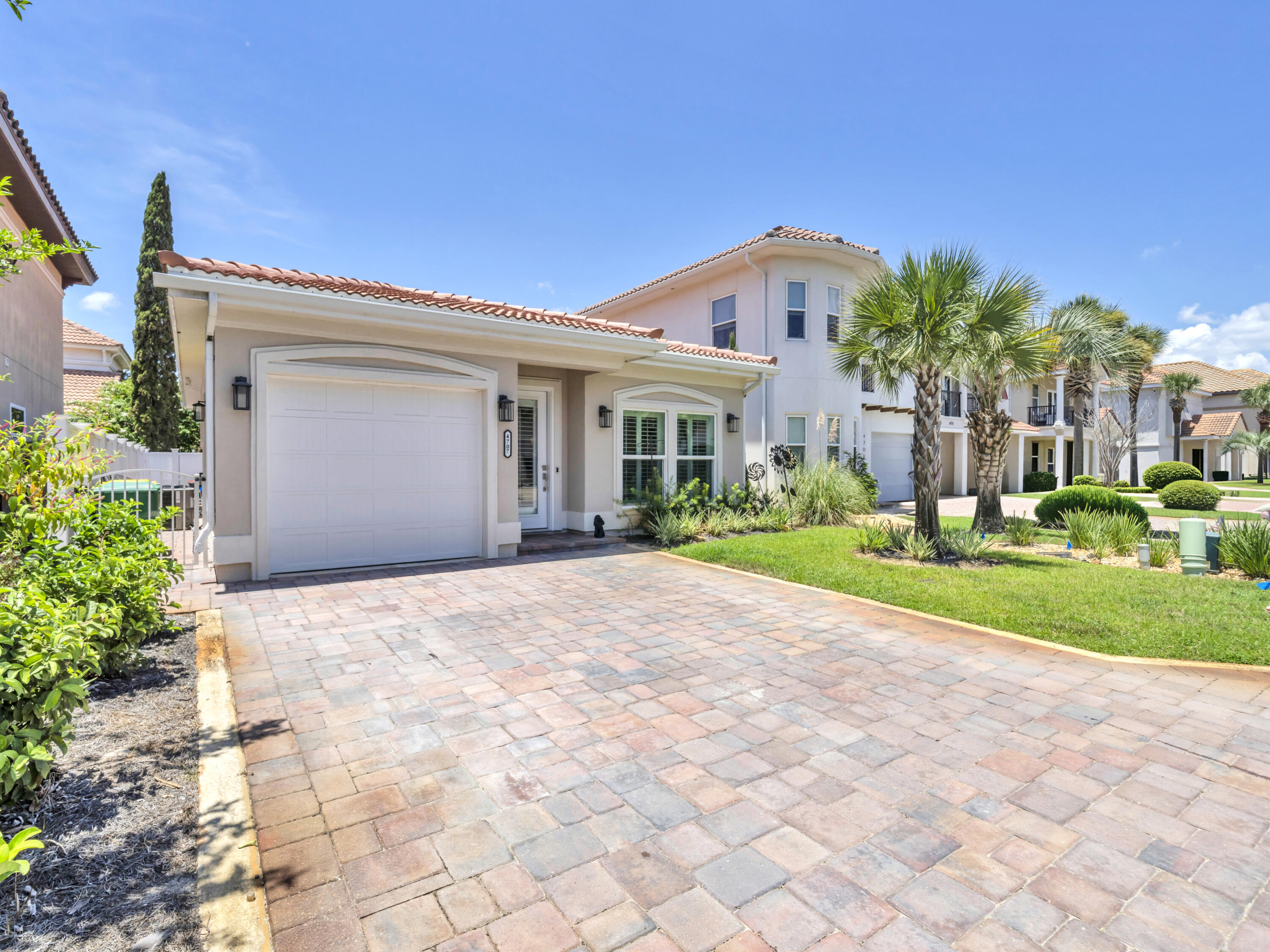 ONE-OF-A-KIND! This exceptional Calusa Bay home has never been on the market. Constructed just two years ago by a reputable, local builder, it is one of the very few SINGLE-STORY homes in the whole community. This custom build was meant to be a forever home and has ALL the upgrades you would anticipate. Upon entering you will observe the spacious 9ft ceilings, plantation shutters on all windows, and lovely built-in gas fireplace with cabinets. The open concept flows to the modern kitchen with top-of-the-line quartz countertops, gas stove, and stainless steel appliances. Being a 2023 home means everything is only 2 years old! Both bedrooms are situated at the rear of the home and each features an en-suite bath, privacy windows, and sliding glass doors to the back patio. Each bathroom is GORGEOUS and features a frameless glass tiled shower with a tub/shower combo in the second bath. Inside the laundry room is a sink and additional cabinet space. Plus the existing washer and dryer will remain with the home. Outside on the paver patio is plenty of space for entertaining and relaxing. There is a tall fence for privacy and a retractable awning along the length of the patio to keep things shaded on summer days. The one-car garage is convenient for a vehicle or additional storage. Plus, there is a Generac generator for peace of mind.
Calusa Bay boasts comparatively low HOA fees while still being a gated community with a refreshing community pool for residents to enjoy. No short term rentals are allowed, which contributes to the neighborhood atmosphere. It's a golf-cart friendly community and only a short drive to the Regatta Bay Golf Club. The location is superb. It is less than 2 miles to Destin Commons with 85+ shopping and dining options including Whole Foods, Lowe's, and many top-rated restaurants. There are also several beach accesses within a few miles of the home to enjoy beautiful white sand and Emerald water. Schedule your showing today!