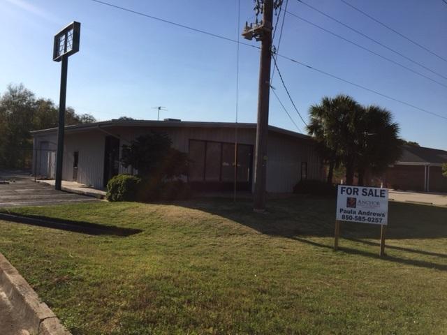 Great building and good location. Building has been redone inside to include new paint, new floors, new window coverings, two new bathrooms, new ceiling fans, light fixtures and more. Also has two new HVAC units. Approx. 2500 sq. ft. finished space and 1000 sq. ft. of warehouse. Large lot is secured and fenced. Plenty of parking. Come see it today.