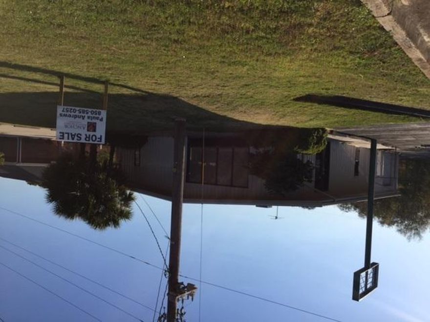 Great building and good location. Building has been redone inside to include new paint, new floors, new window coverings, two new bathrooms, new ceiling fans, light fixtures and more. Also has two new HVAC units. Approx. 2500 sq. ft. finished space and 1000 sq. ft. of warehouse. Large lot is secured and fenced. Plenty of parking. Come see it today.
