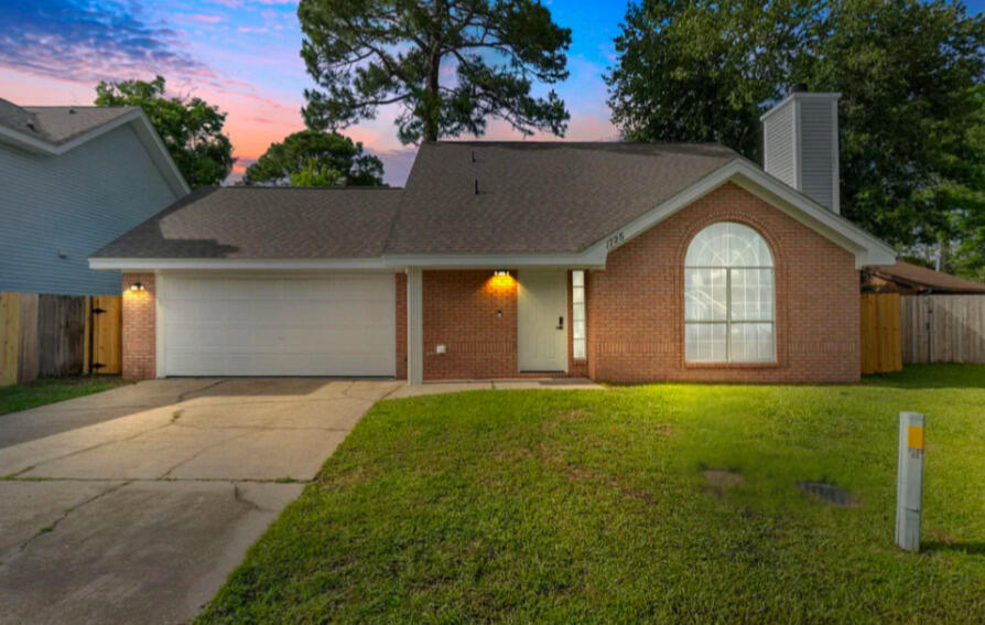 Welcome to 1725 Colonial Ct, a stylishly updated 3-bedroom, 2-bath home in the heart of Fort Walton Beach. Enjoy a bright, open layout with vaulted ceilings, luxury vinyl plank flooring, and a cozy fireplace. The kitchen features granite countertops, modern fixtures, and a sleek backsplash. Both bathrooms have been tastefully renovated, and a brand-new roof adds peace of mind. Just minutes from Okaloosa Island beaches, Eglin AFB, Hurlburt Field, and local dining and shopping, this home offers the perfect mix of comfort, convenience, and location. Come see it for yourself!