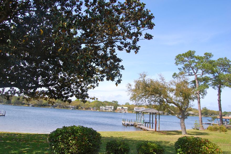 WATERFRONT residence perfectly situated on Cinco Bayou boasting 125 FEET OF WATER FRONTAGE. Interior features:hardwood flooring throughout main living areas, newly updated kitchen with solid surface counter tops, newly renovated downstairs full bathroom, and master bedroom overlooking Cinco Bayou. Exterior features include beach frontage, 125 feet of water frontage, dock with boat lift, and lush landscaping. Home is centrally located in the heart of Fort Walton Beach and within close proximity to area bases, dining, shopping and more! By boat, you are within minutes to Crab Island, Gulf of Mexico, and other boating activities. Make 218 Costaki Court your Fort Walton Beach address today.