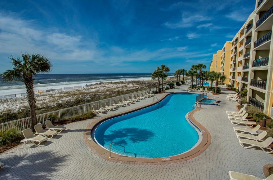 Three bedroom/two bath condominium with gulf views and great amenities including 2 large pools and private beach access for owners and renters on beautiful Okaloosa Island! Enjoy the views and sea air from your large private patio. The kitchen includes granite countertops, breakfast bar, and stainless appliances. The master suite enjoys gulf views, double sinks, large jetted tub, and separate shower. 2 additional bedrooms share a bath. Easy-to-clean tile floors, full laundry, and lockout closet. Azure offers covered parking, a spacious lobby, workout facility, 2 pools/spas, spray park, and private beach walkover. Excellent potential for rental income.