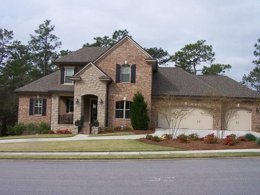 This magnificent three level home w/a finished walkout basement combines elegance with eminent livability. The raised elevation poises this beauty high above street level and w/the circular drive, it exudes impressive curb appeal. It is located on almost 1/2 acre w/the nature preserve next door, providing the utmost privacy and beautiful wooded views. Outdoor decks on 2 levels presents the perfect backdrop for both fabulous entertaining and a relaxed Florida lifestyle. Custom built by Randy Wise Homes w/high quality materials and solid construction. The exterior features: all low maintenance brick w/stone accents and hardiplank trim, high impact windows, spacious 3 car garage, circular driveway, sprinkler system and is professionally landscaped.