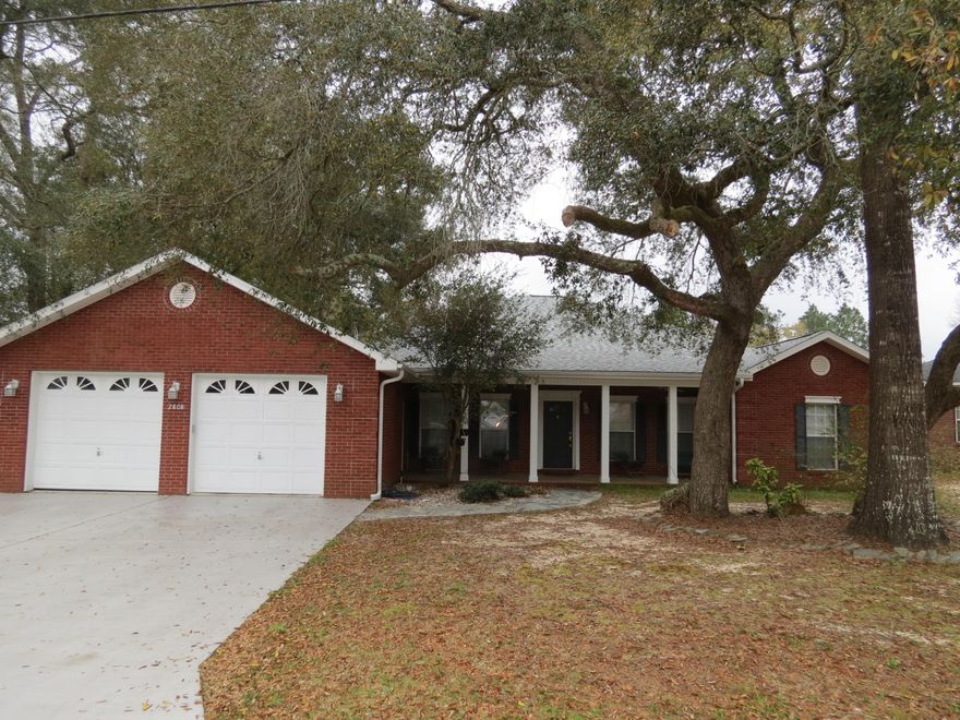 Location, location, location! This beautiful, custom built home is conveniently located in the beautiful neighborhood of Pinnacle Point in South Crestview! Featuring 4 bedrooms, 3 baths, an office, a large living space, 2 patios and a deck, this home is ideal for entertaining. The split floor plan is great for families or friends with two large bedrooms and a full bath at the front of the house, and two master suites toward the back. Both master suites feature walk-in closets, a full bath, and plenty of space for over-sized furniture. In the living room, enjoy the beautiful new wood floors (2014), a gas fireplace, huge eating area, crown molding, and plenty of sunlight through the large windows and balcony doors! This open concept home also features an attic fan to help