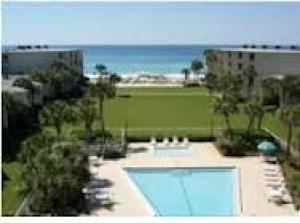 Interior photos coming soon. Silver Dunes is centrally located between the Destin Harbor and Sandestin Resort. Great complex with many amenities. Silver Dunes is a beachfront condo located on the South side of 98. GATED COMMUNITY! DEEDED BEACH! NOT a High-rise building! The patio opens to the lovely landscaped courtyard. This ground floor unit offers convenience for grilling and walking to the pool and beach. The great rentals provide a great return on investment at this low price.